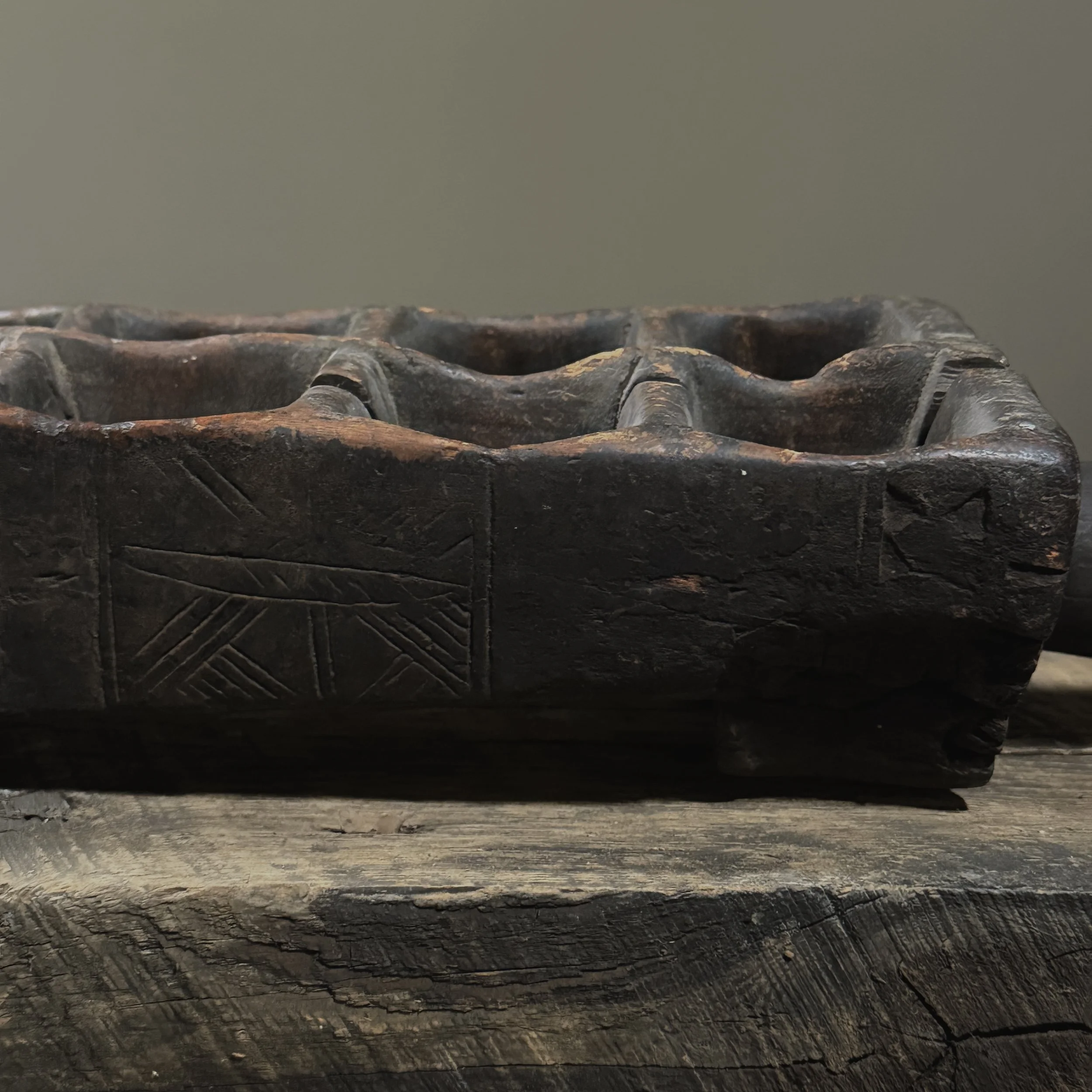 Museum-quality West African mancala board in hardwood with aged surface