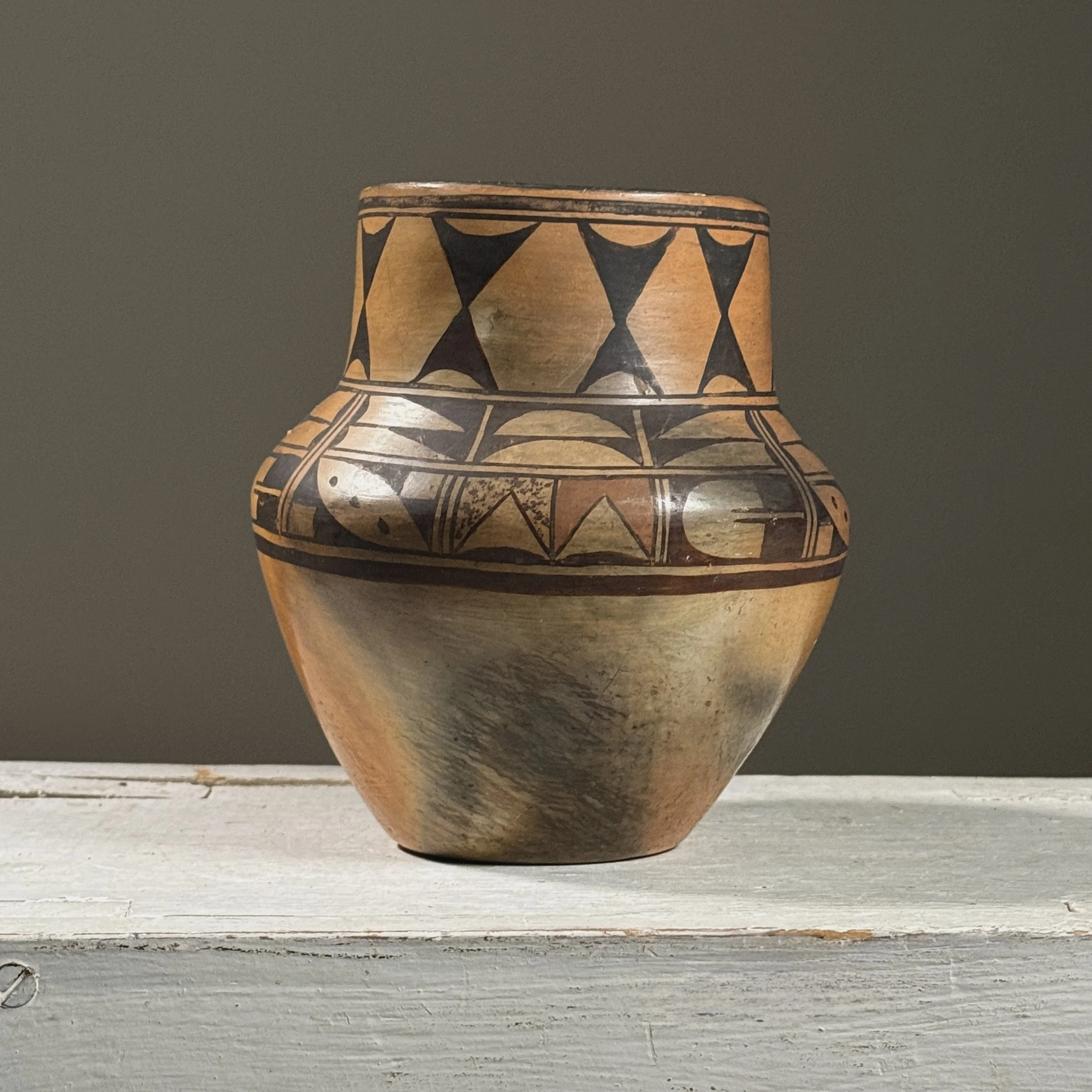 Vintage Hopi polychrome clay vessel with elongated rim, unsigned