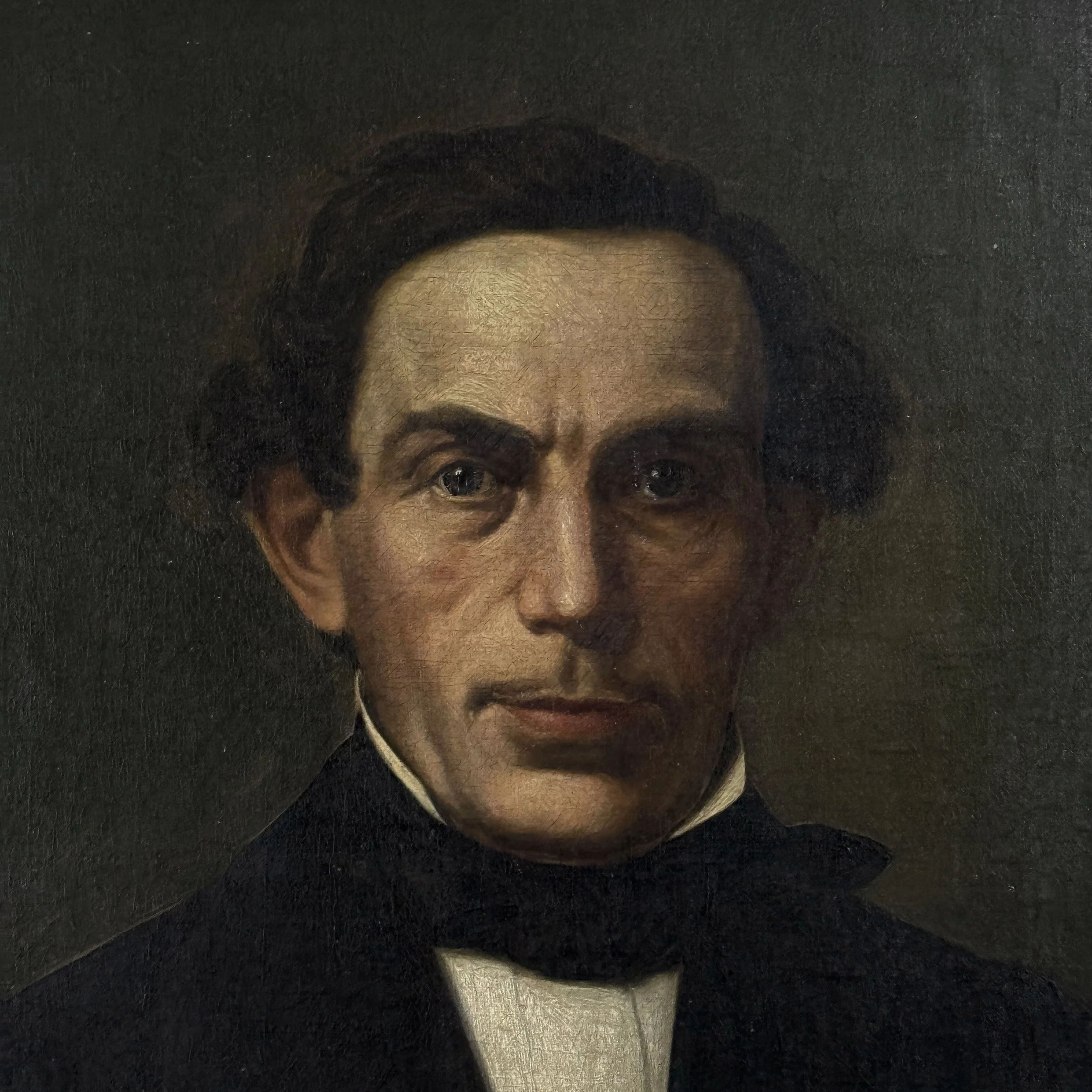 Detail of the sitter's countenance and bust, illustrating the painterly technique