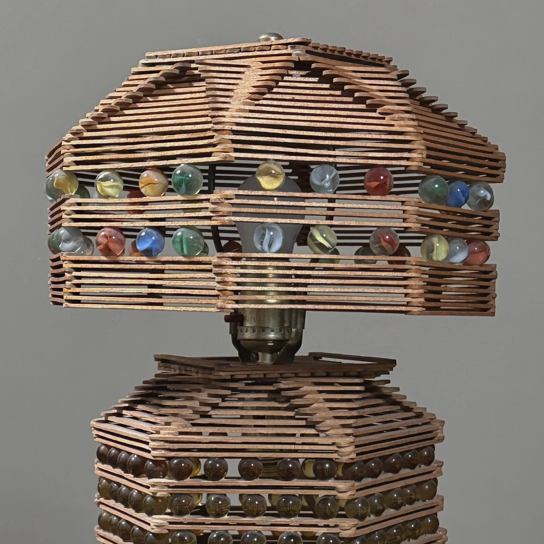 View of the matching shade, showing its intricate patterning and light diffusion.