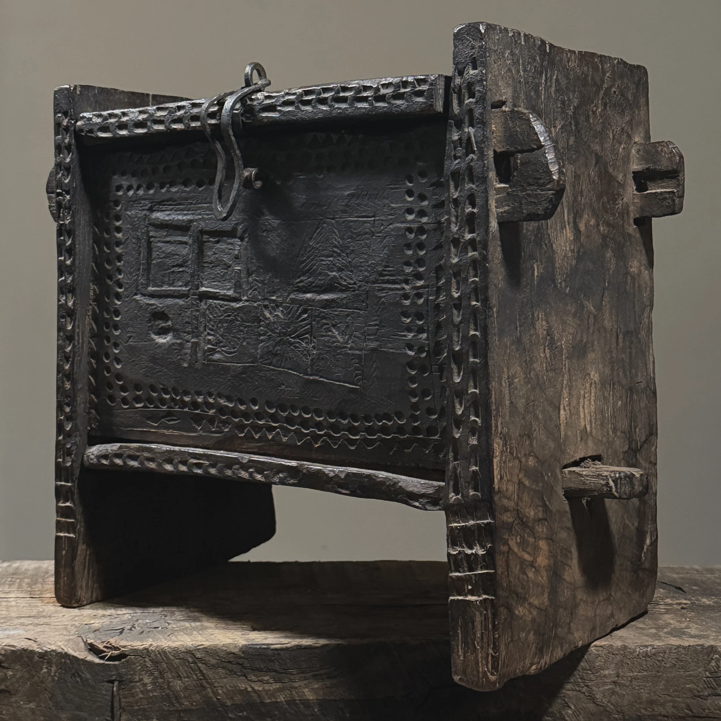 Hand-carved wooden dowry chest with chip-carved geometric motifs
