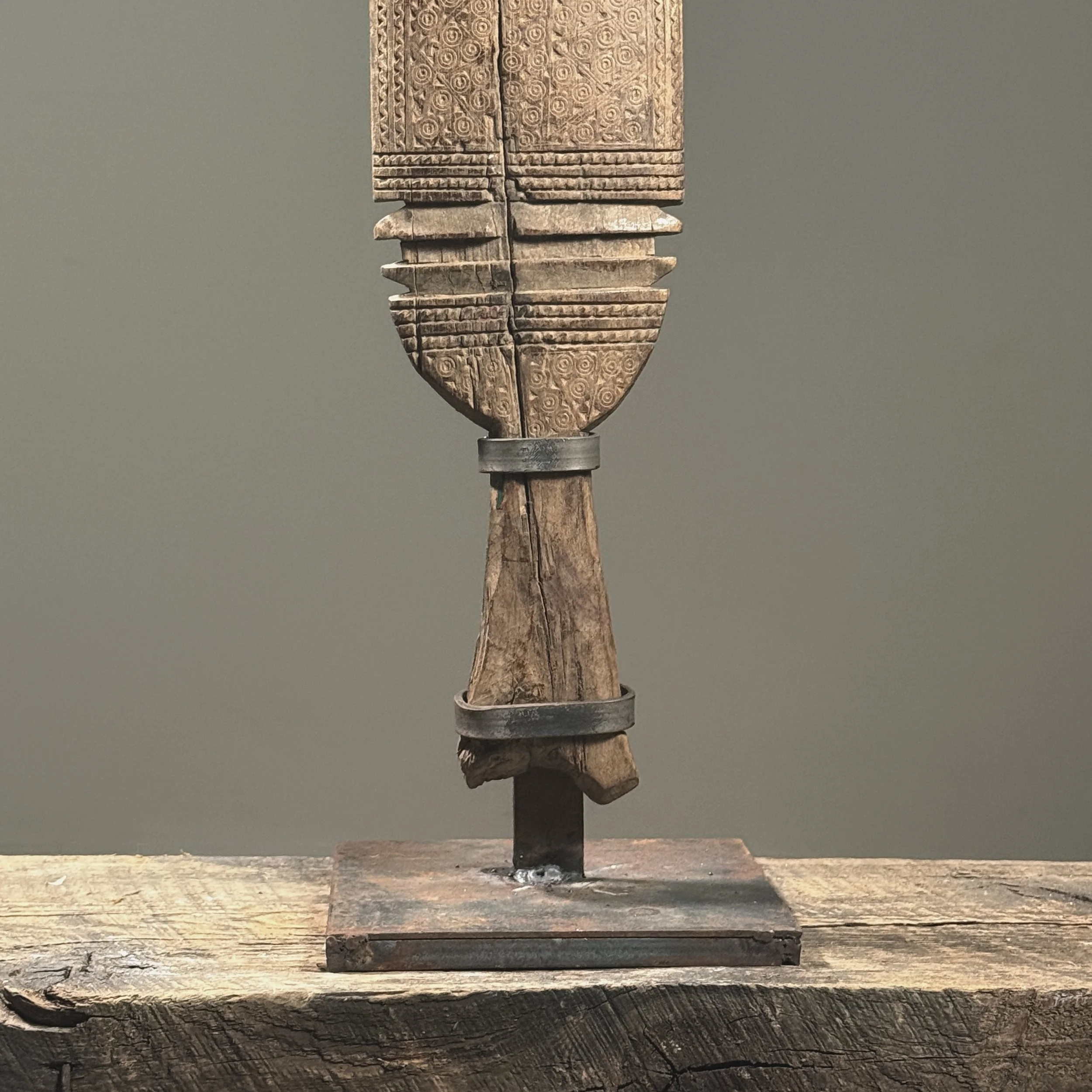 Detail of the patinated iron custom display stand.