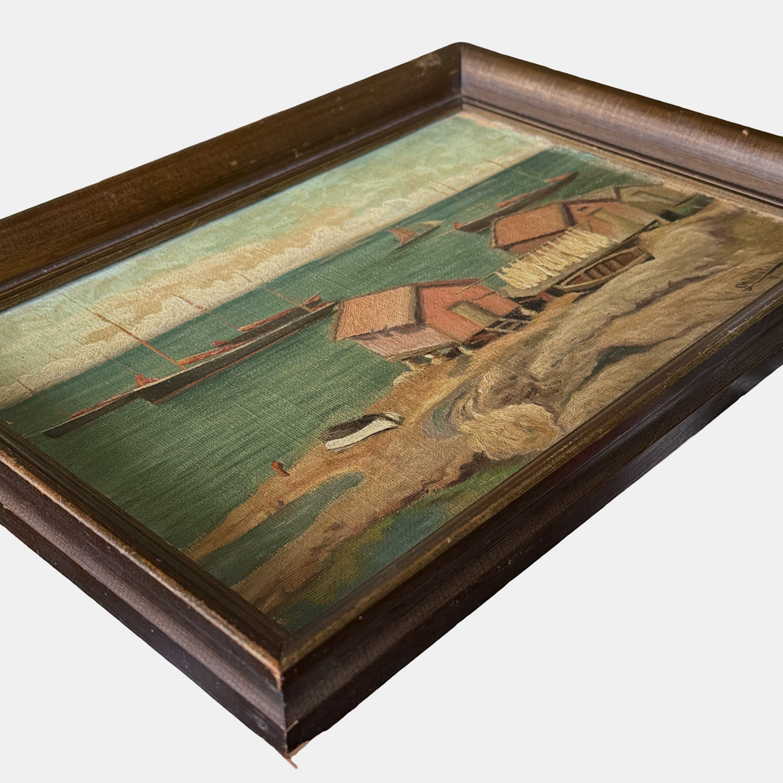 Three-quarter view of 1914 Folk Art harbor seascape showing canvas and original brown frame together