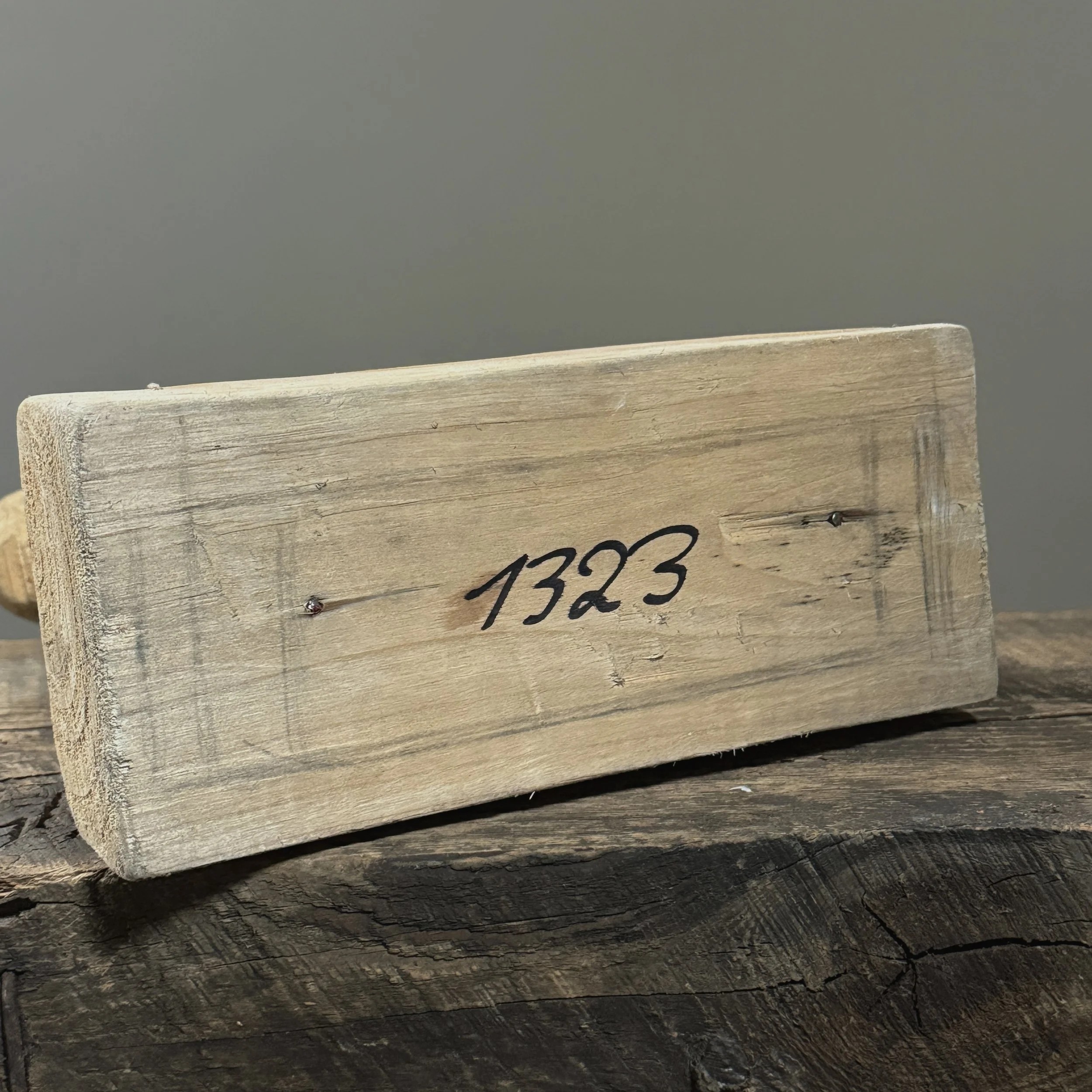 Number written on the bottom of the sculpture.