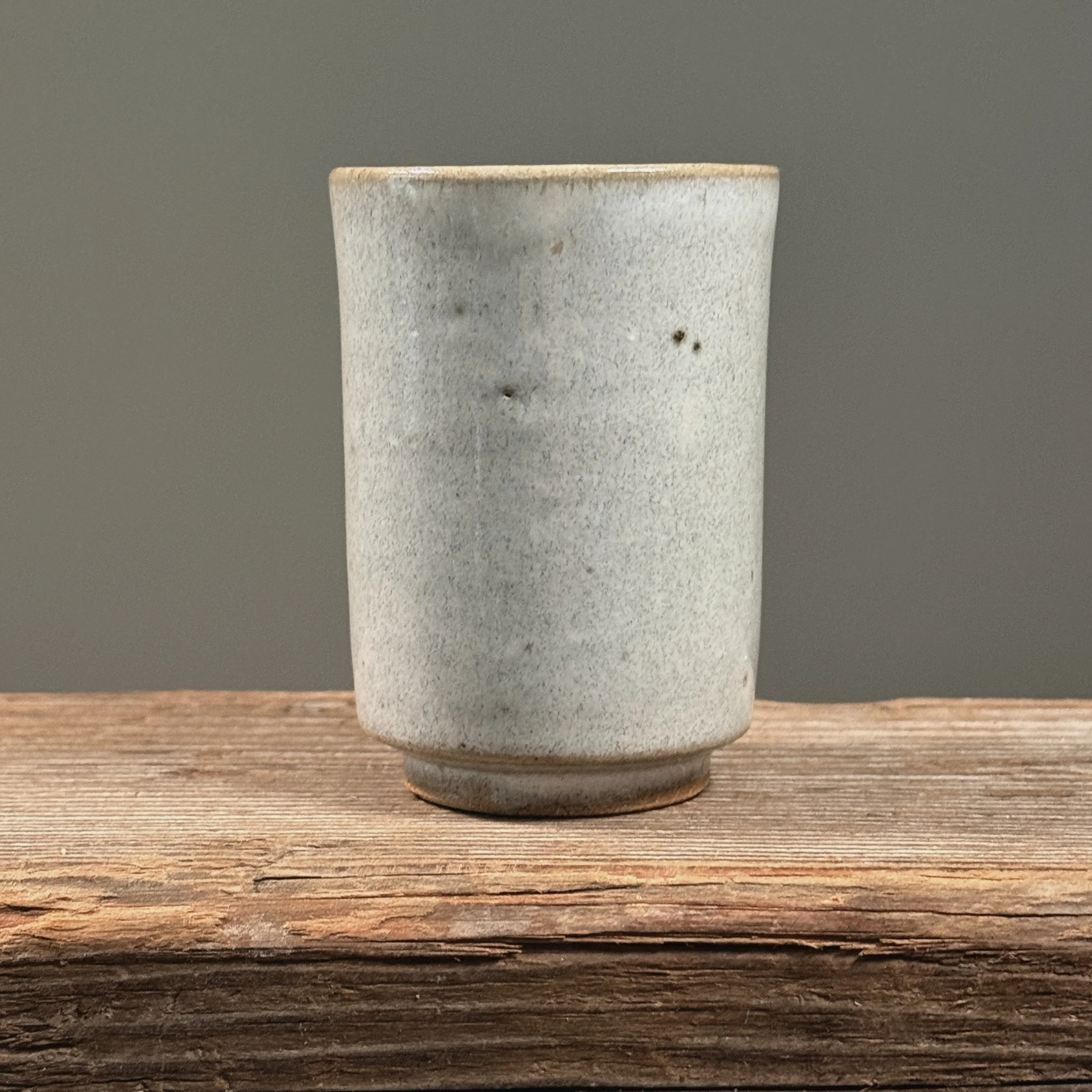 Back view of white cup.
