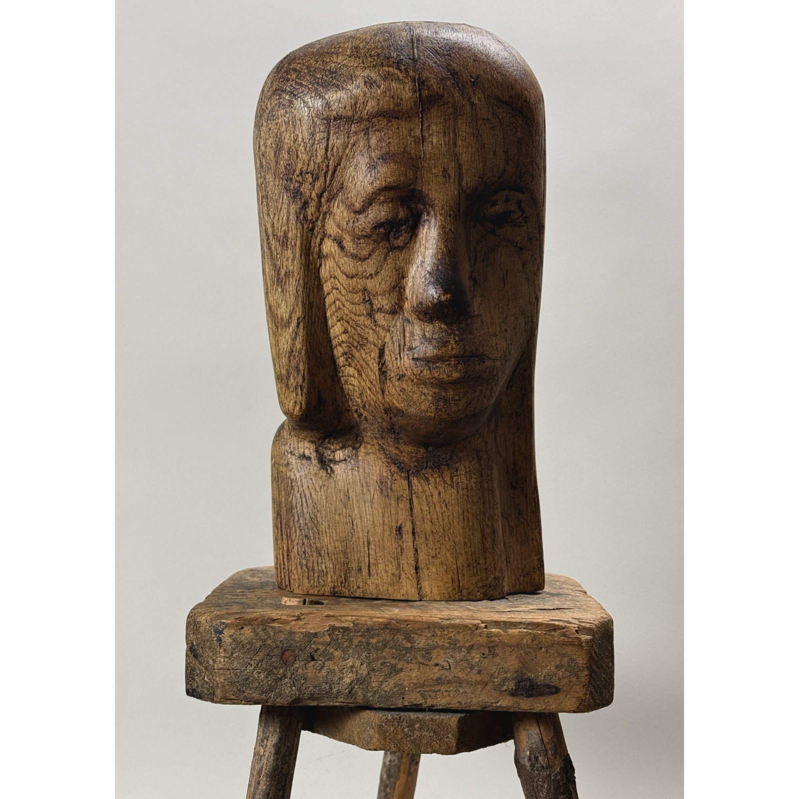Full front view of vintage hand carved Folk Art Modernist portrait bust, wood, deep patina, unsigned