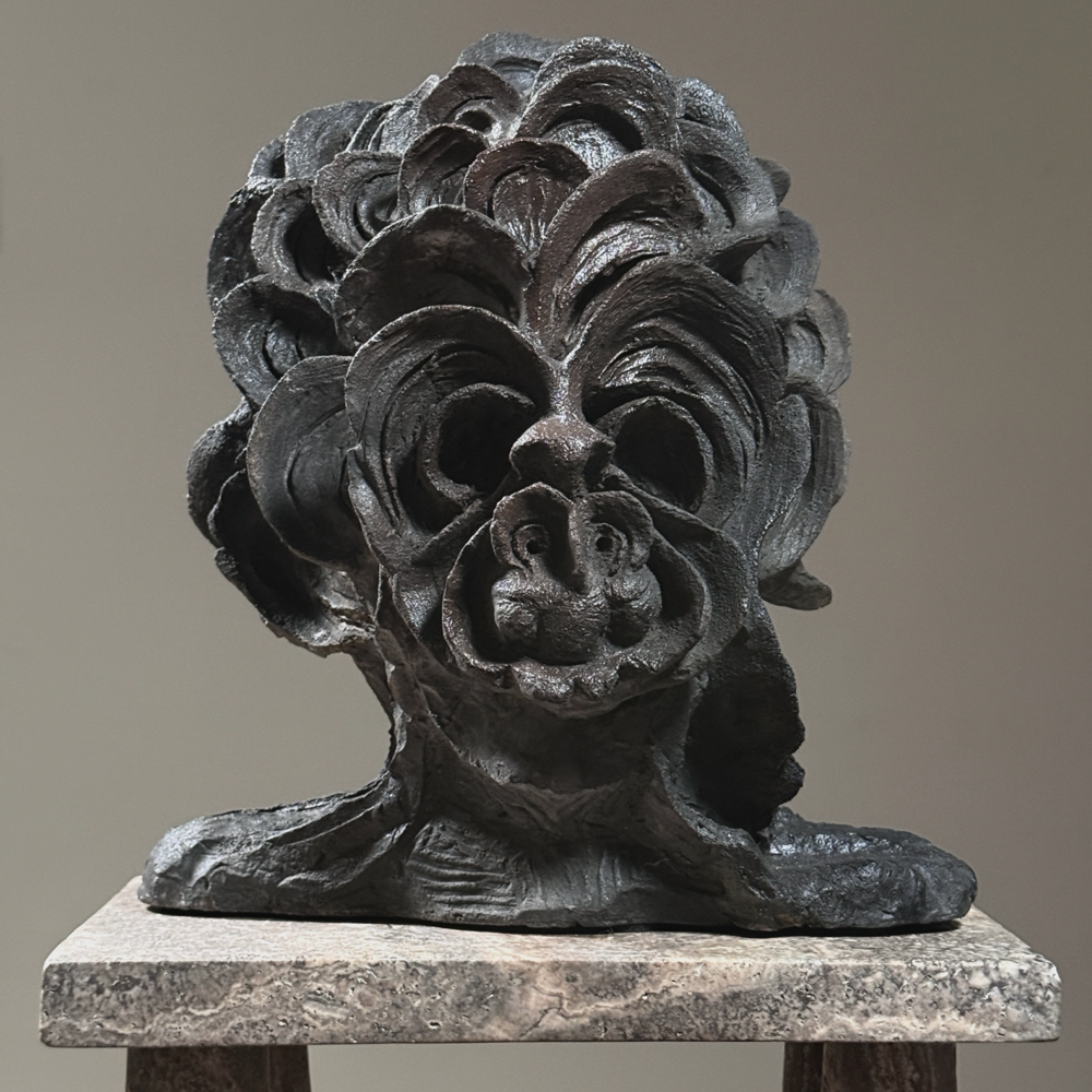 Abstract portrait sculpture by Raymond Rocklin. Black clay. 12 inches height. Brutalist style.