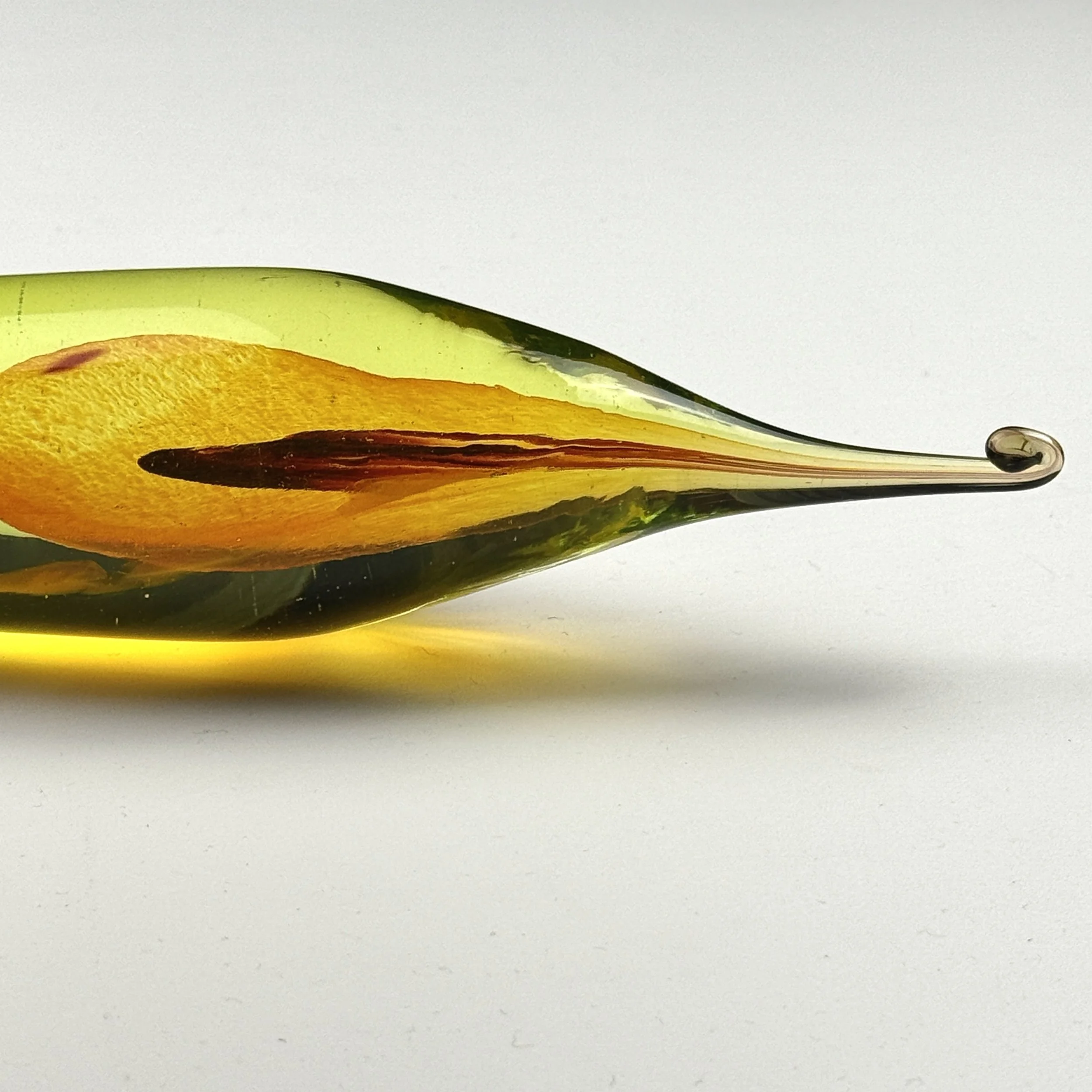 Close-up of glass surface showing subtle variations of clarity and color