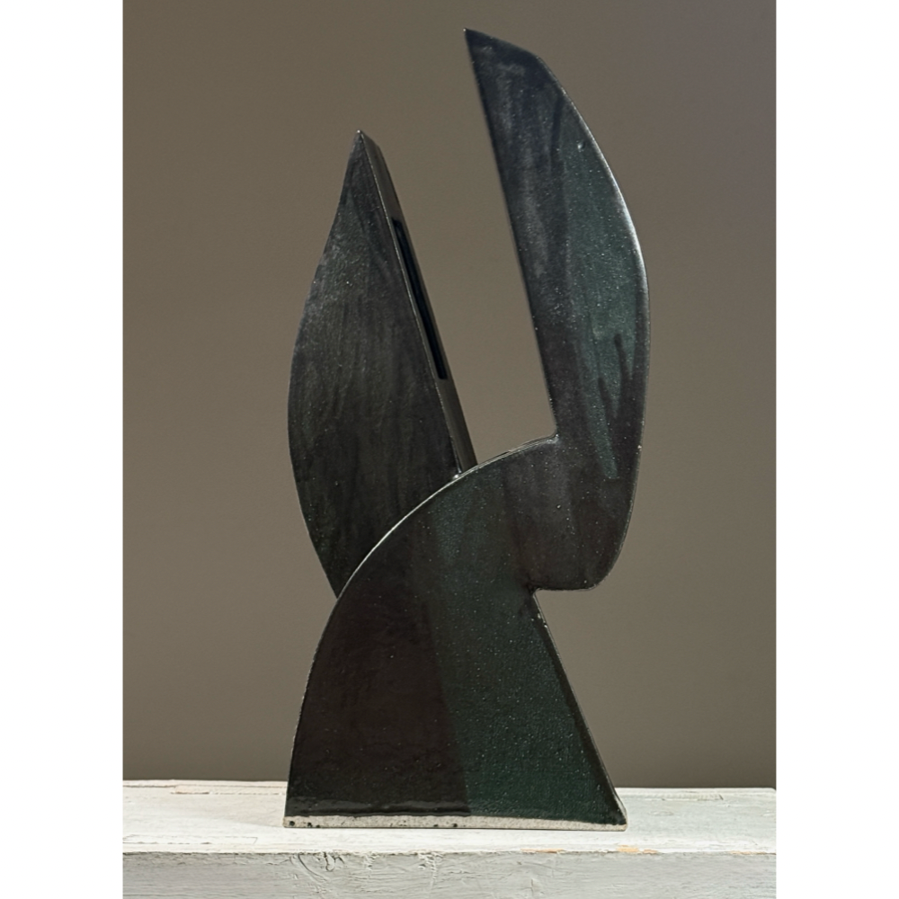 Postmodernist sculptural ceramic ikebana vessel. Glossy black and subtle green glaze. 18.25 inches height.