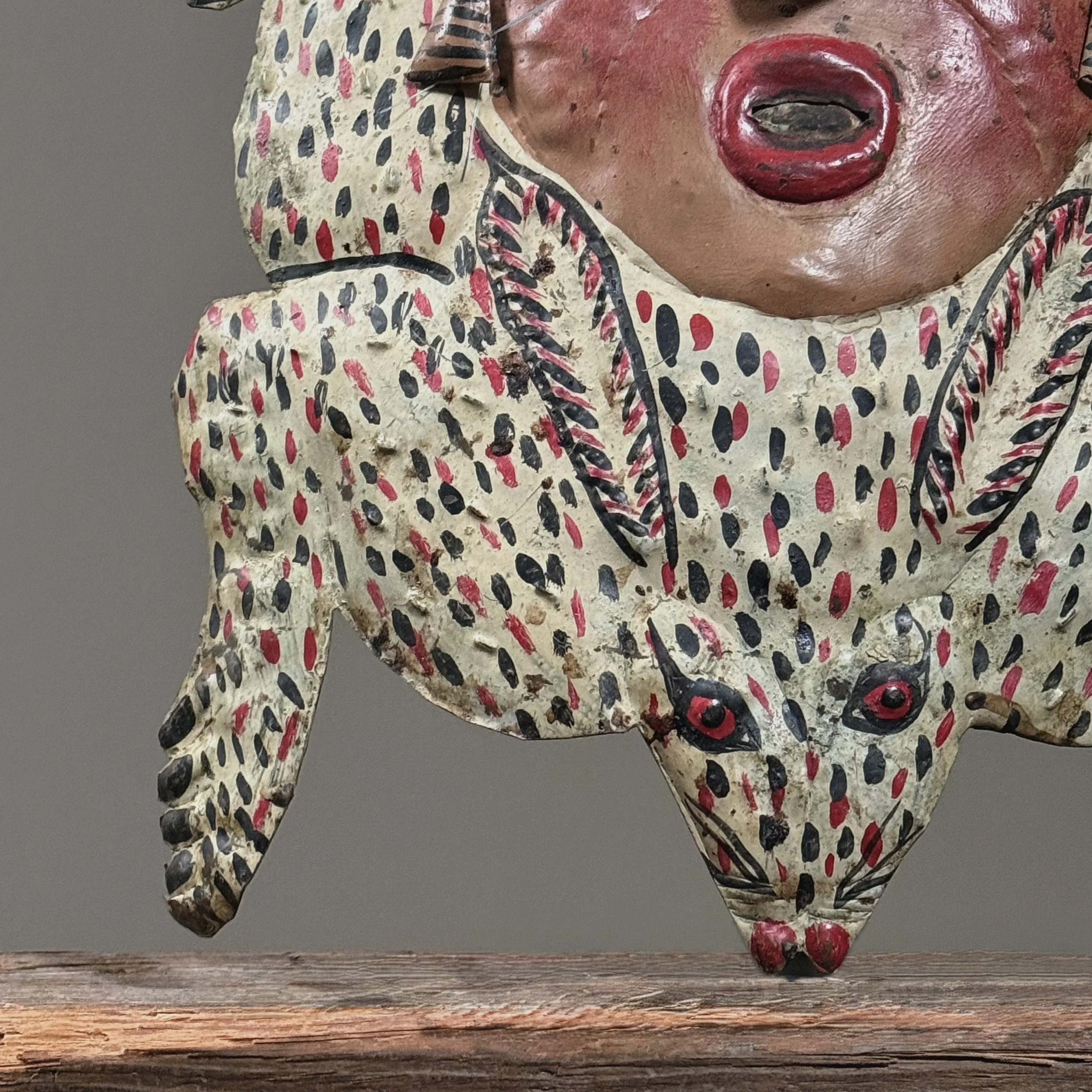 Close-up of hand-painted rabbit woman mask detailing