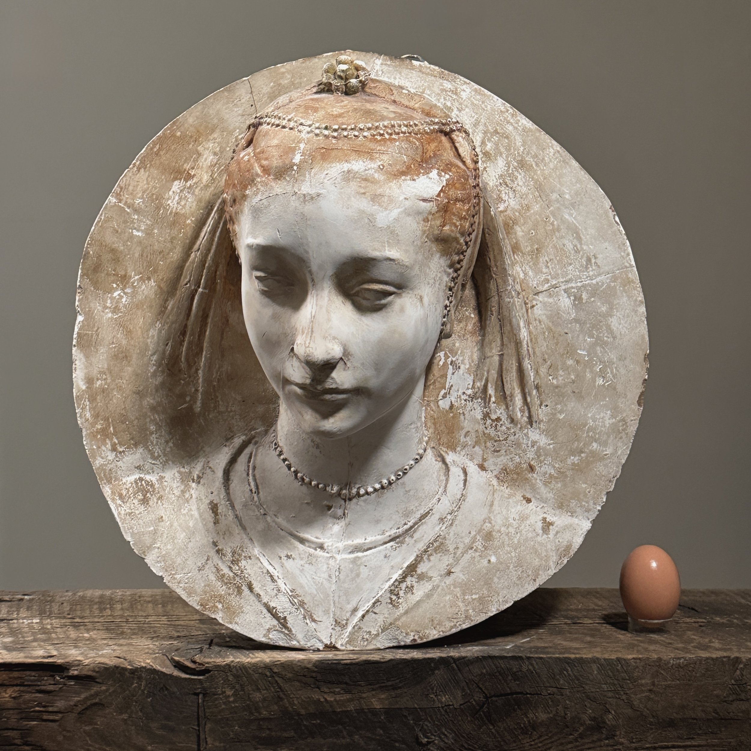 The relief next to an egg for size reference.