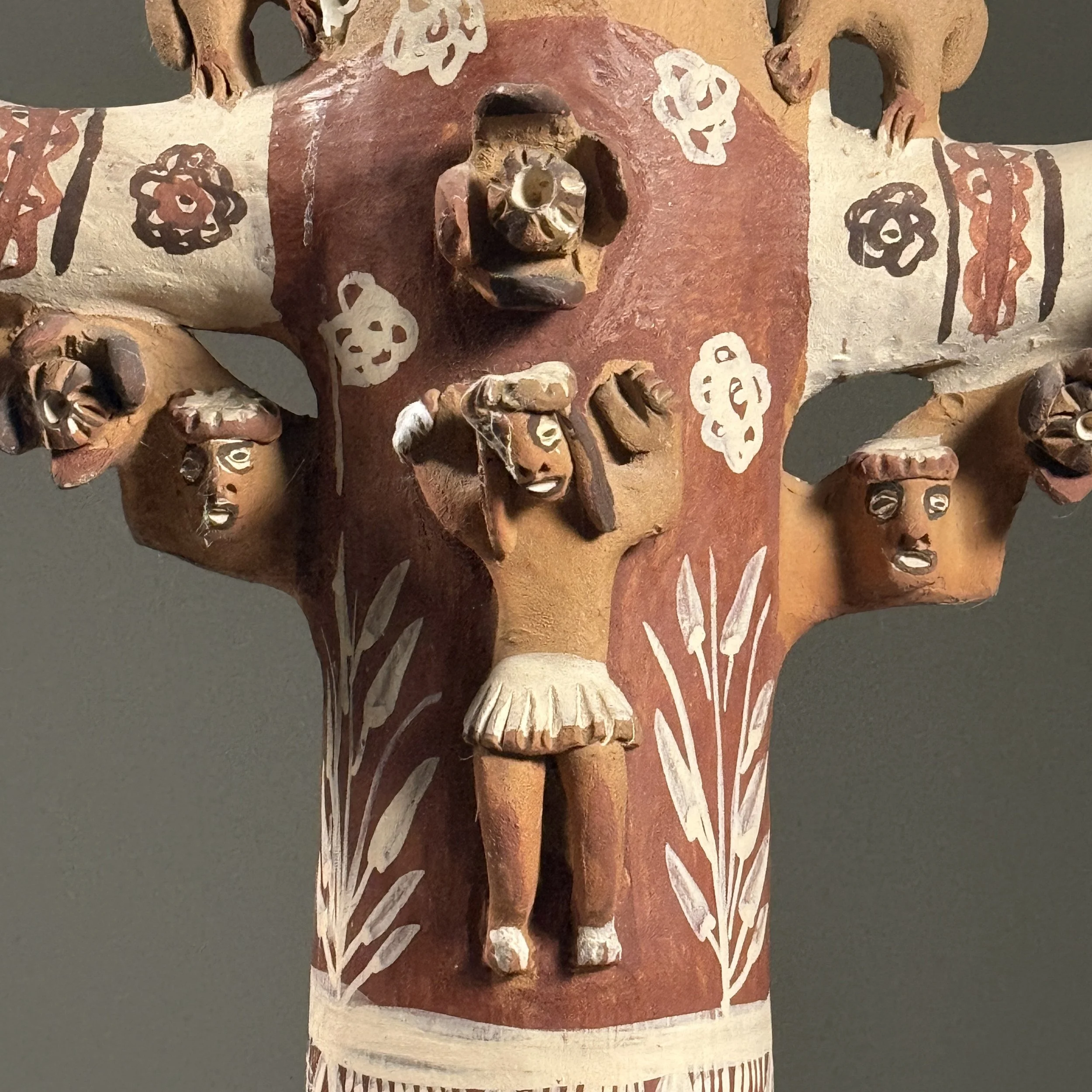 Macro detail of hand-painted polychrome decoration and ceramic construction techniques