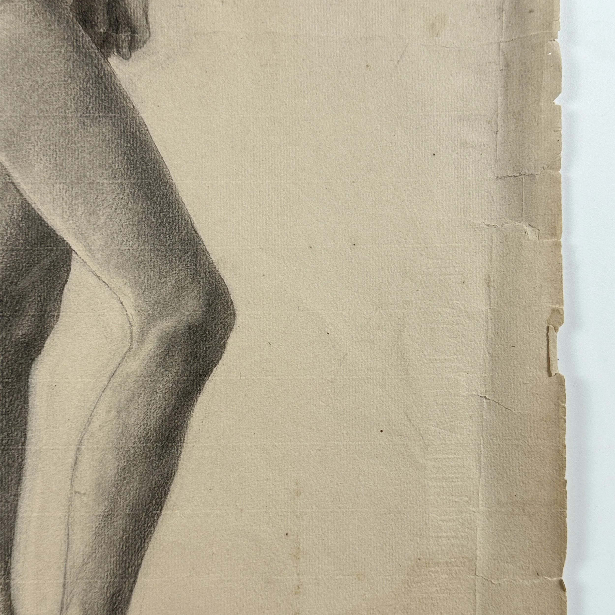 Charcoal sketch with worn and torn edges