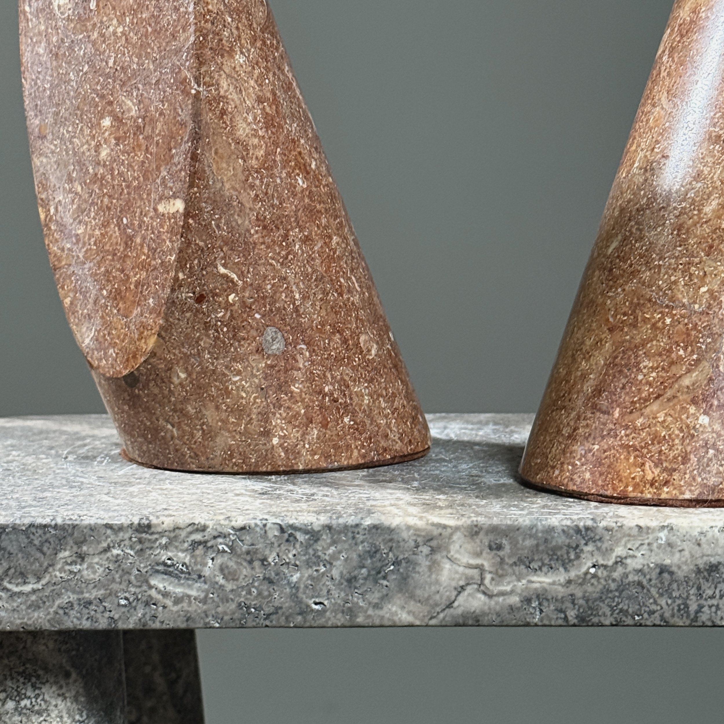 Bookend surface detail. Rosy brown stone. Natural veining.