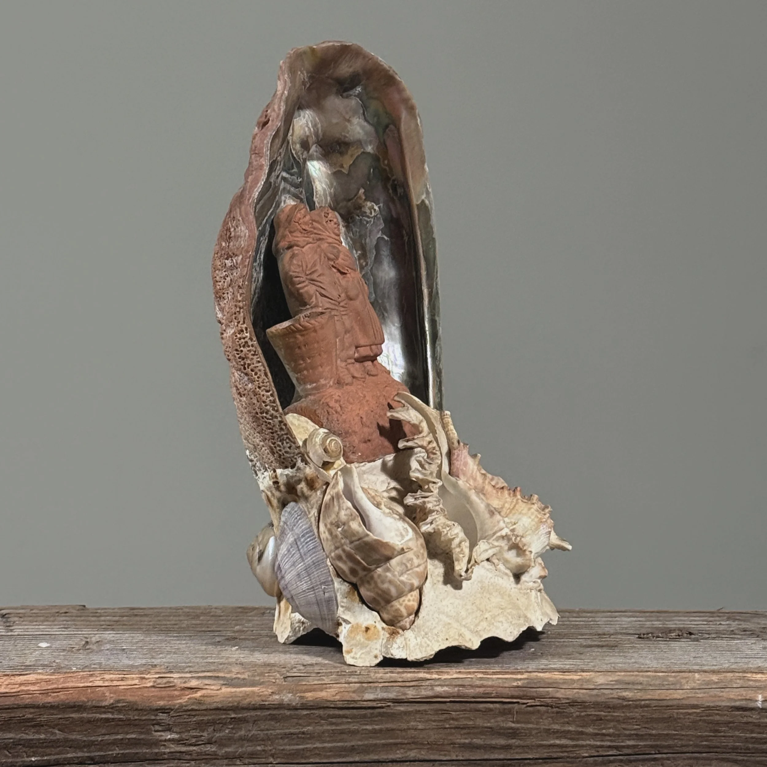 Attributed to Pierre-Adrien Graillon, French terracotta couple in abalone shell, Dieppe folk art
