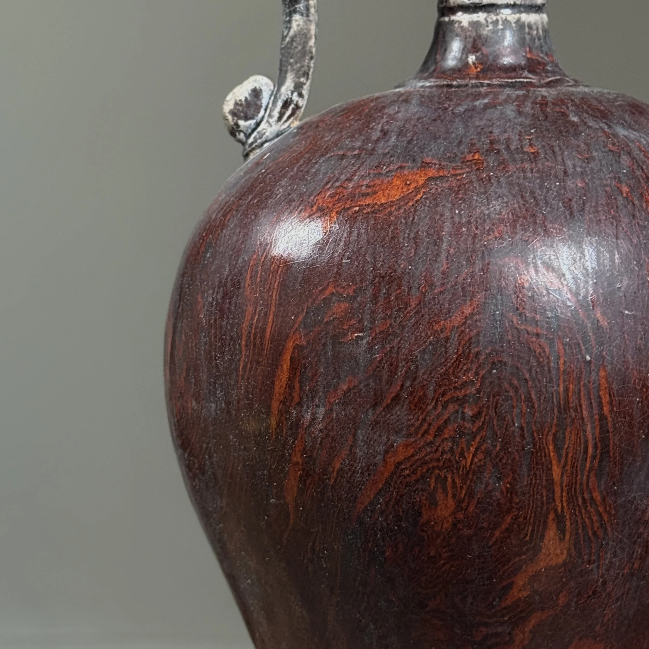 Wood-grain glaze detail on antique Chinese pottery