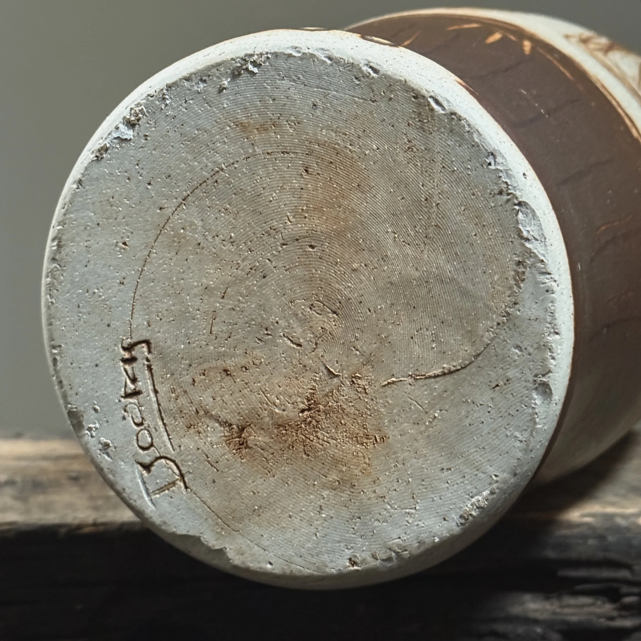 Underside signature on studio art pottery