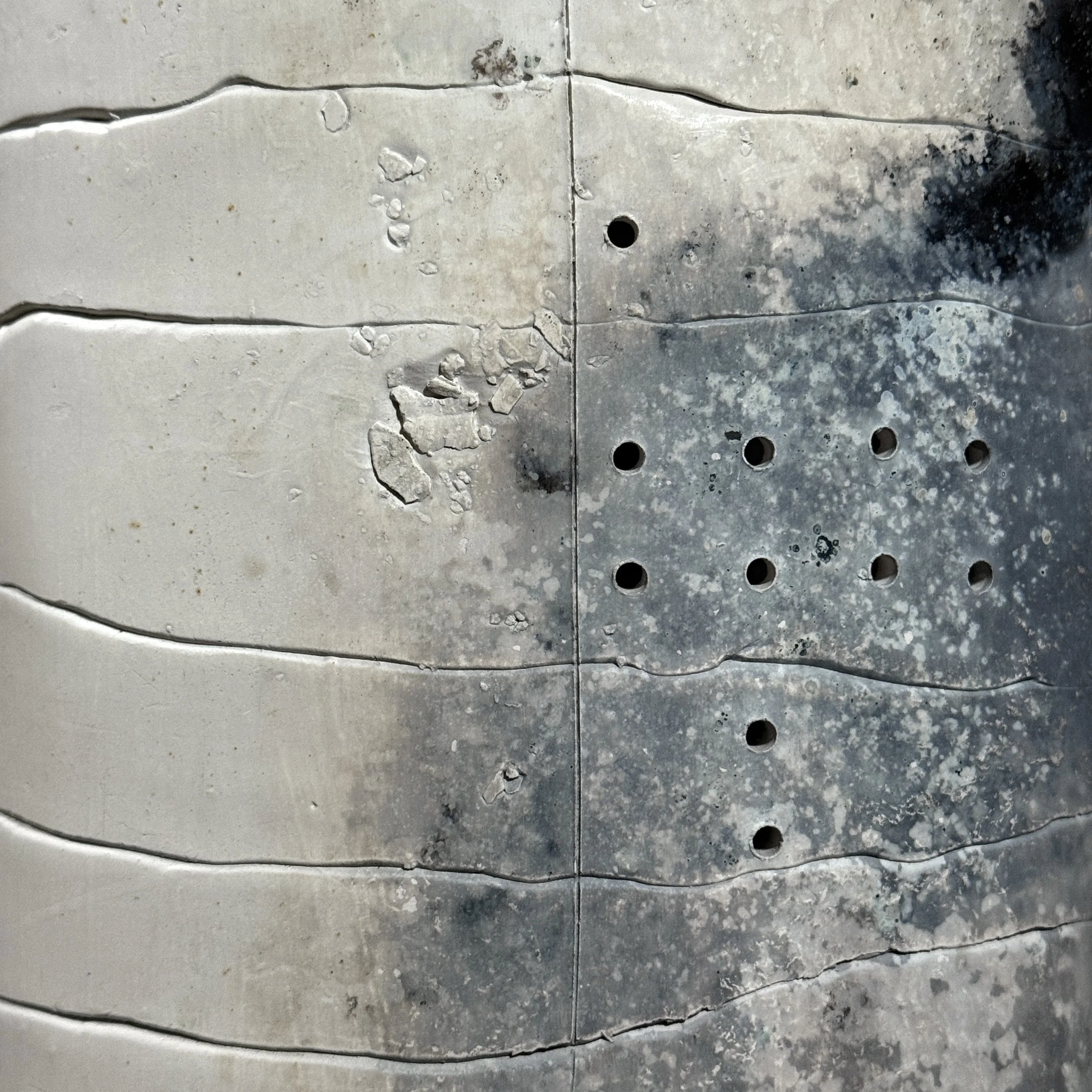 Detail of ash markings on raku ceramic surface