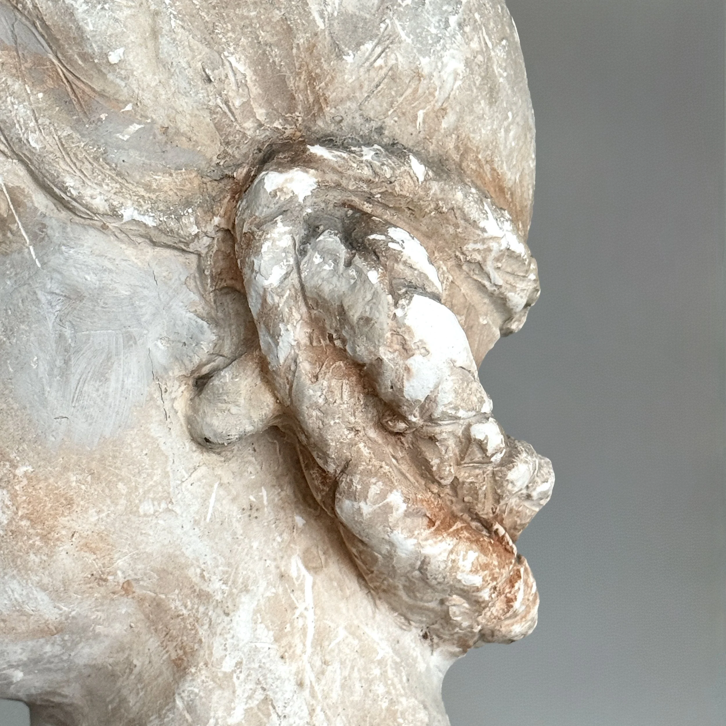 Close-up of braided coiffure on antique Classical Revival bust
