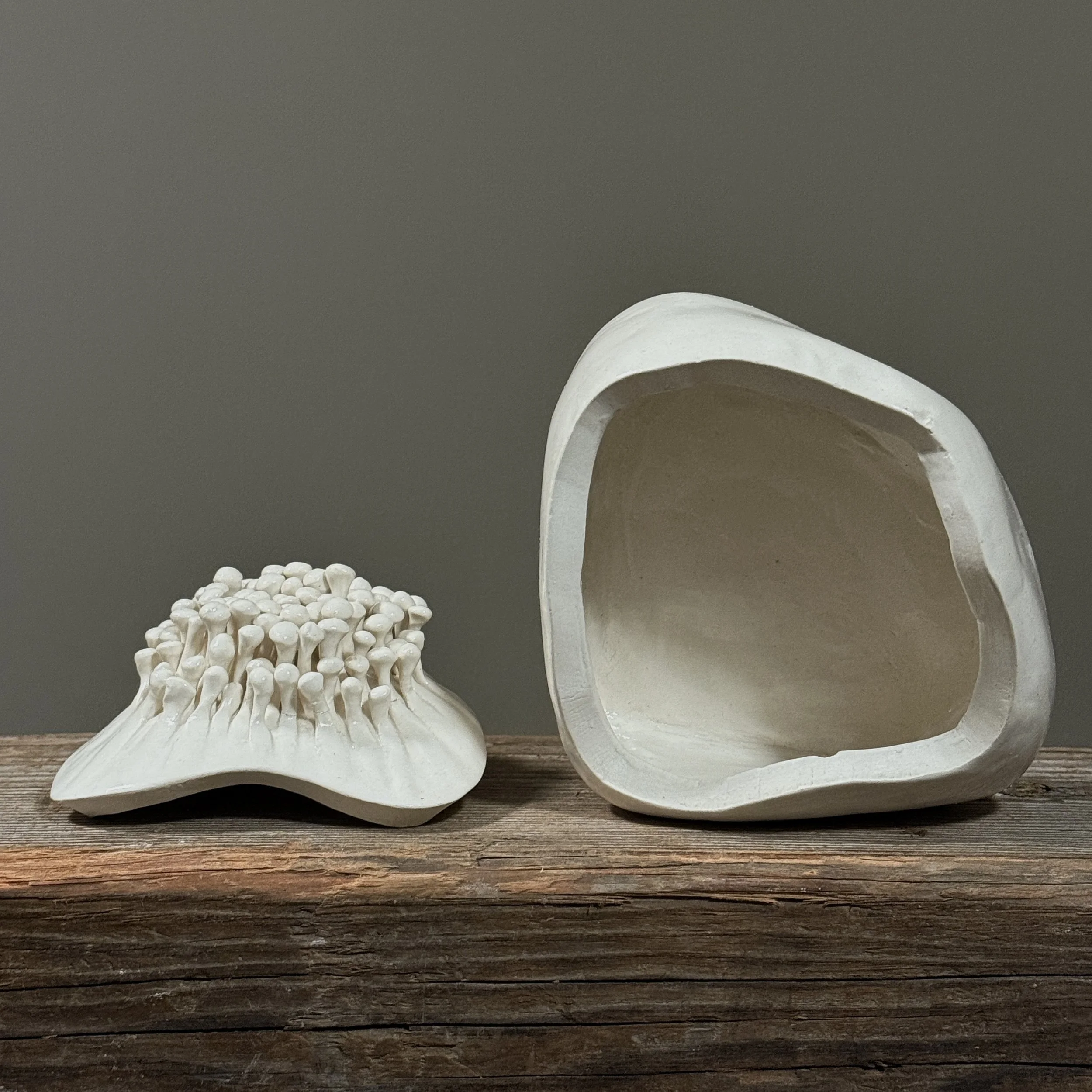 Mid century biomorphic ceramic piece with abstract handle