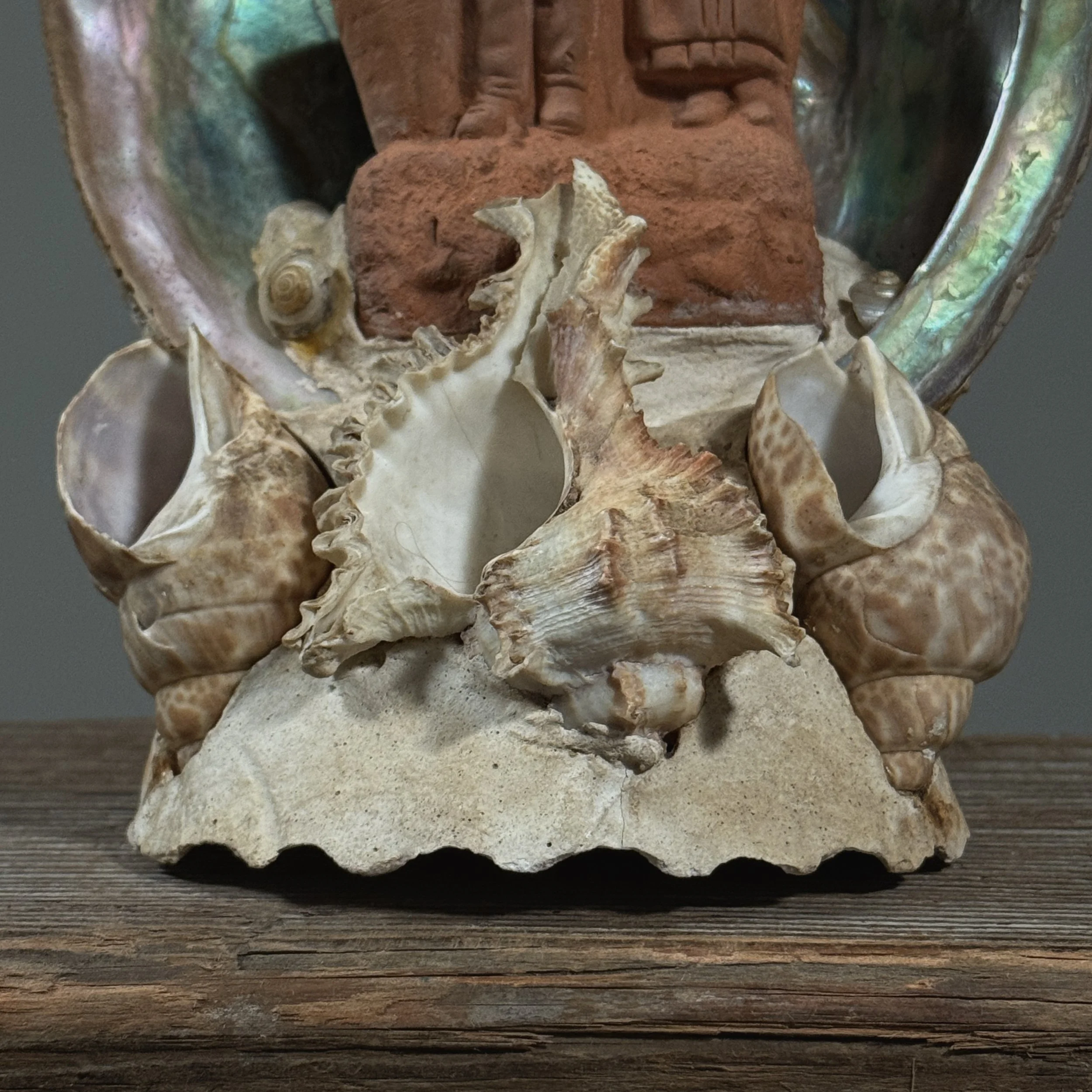 Attributed to Pierre-Adrien Graillon, French terracotta couple in abalone shell, Dieppe folk art