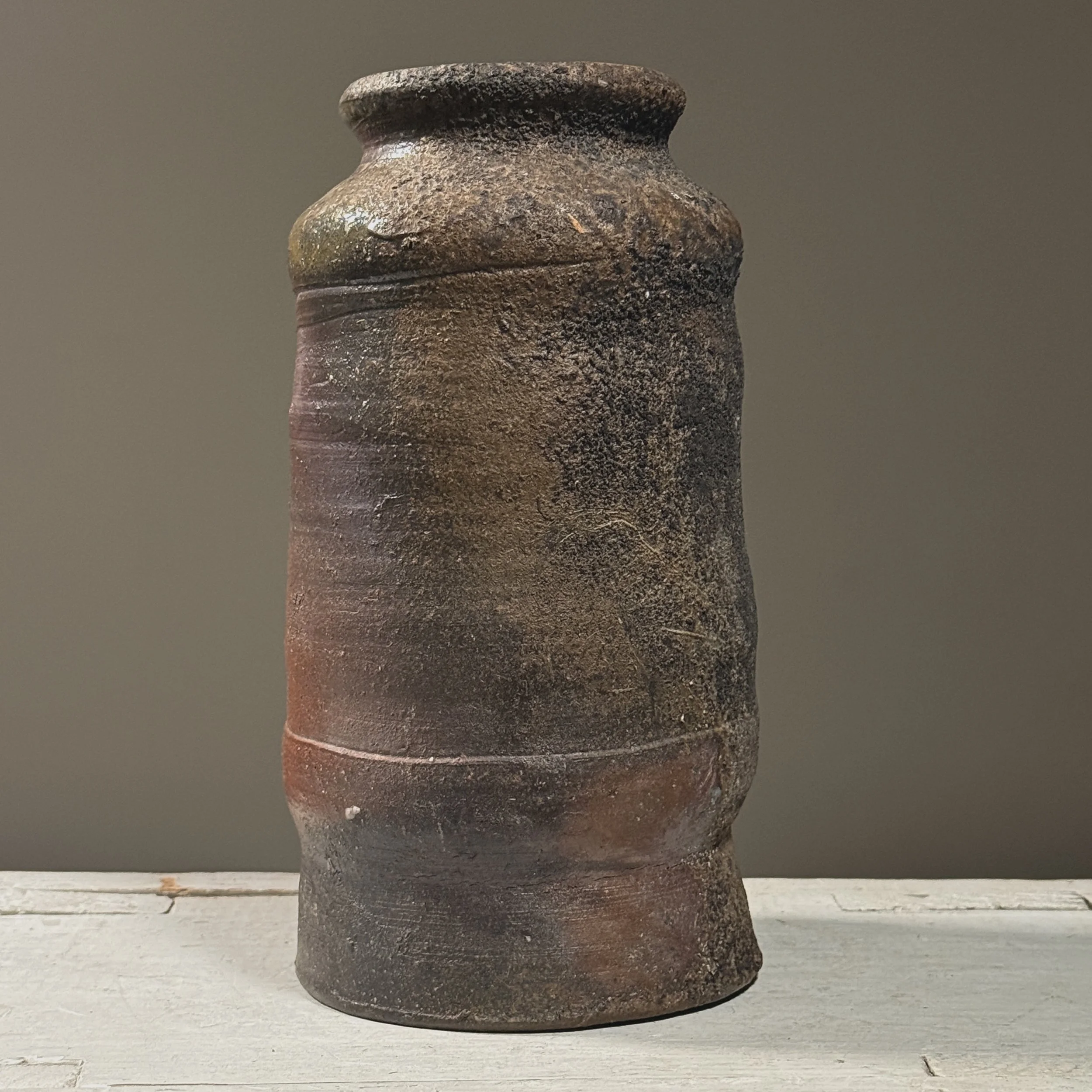 Vintage Japanese Bizen ware wood fired stoneware vessel. 9.25 inches height by 4.75 inches diameter.