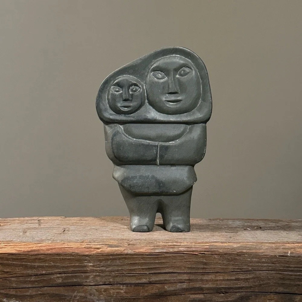 Inuit mother and child stone sculpture by Annie Niviaxie, 1985