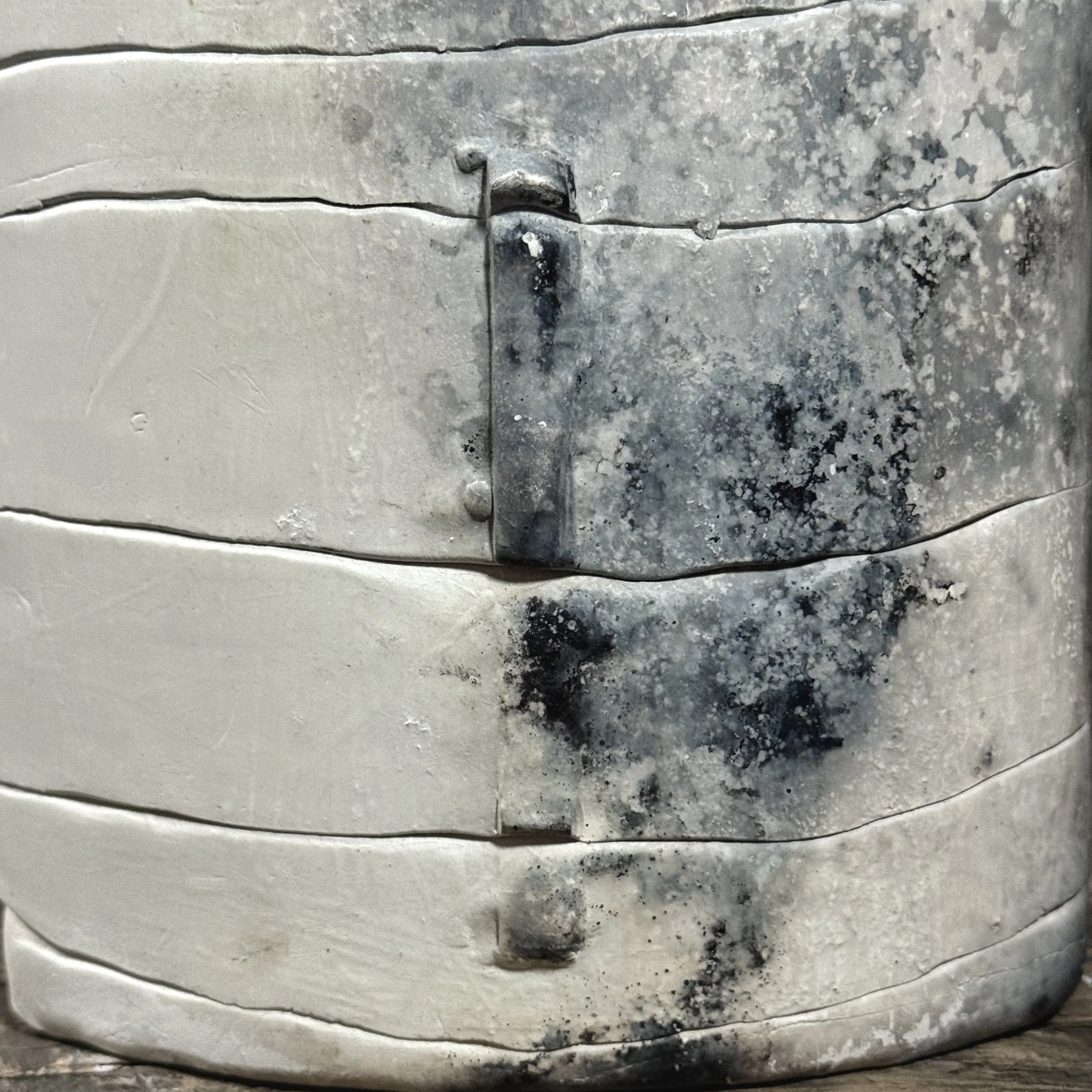 Detail of ash markings on raku ceramic surface