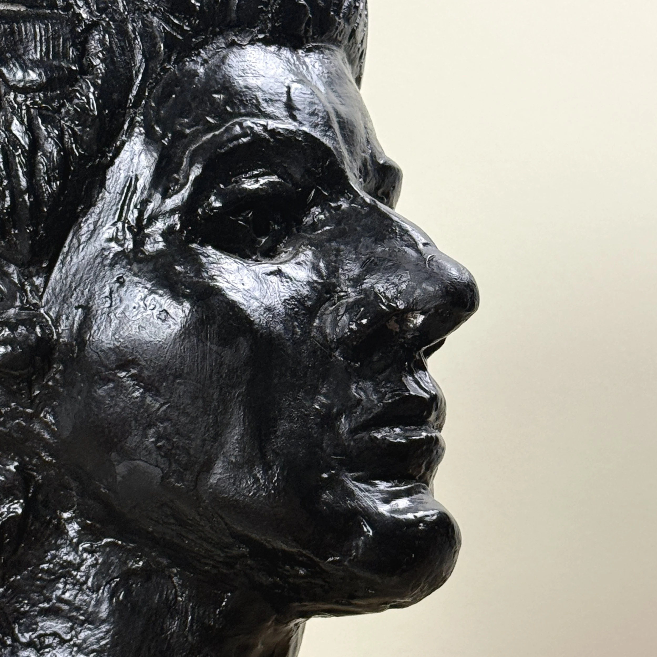 Face detail. Stylized features. Expressionist aesthetic.