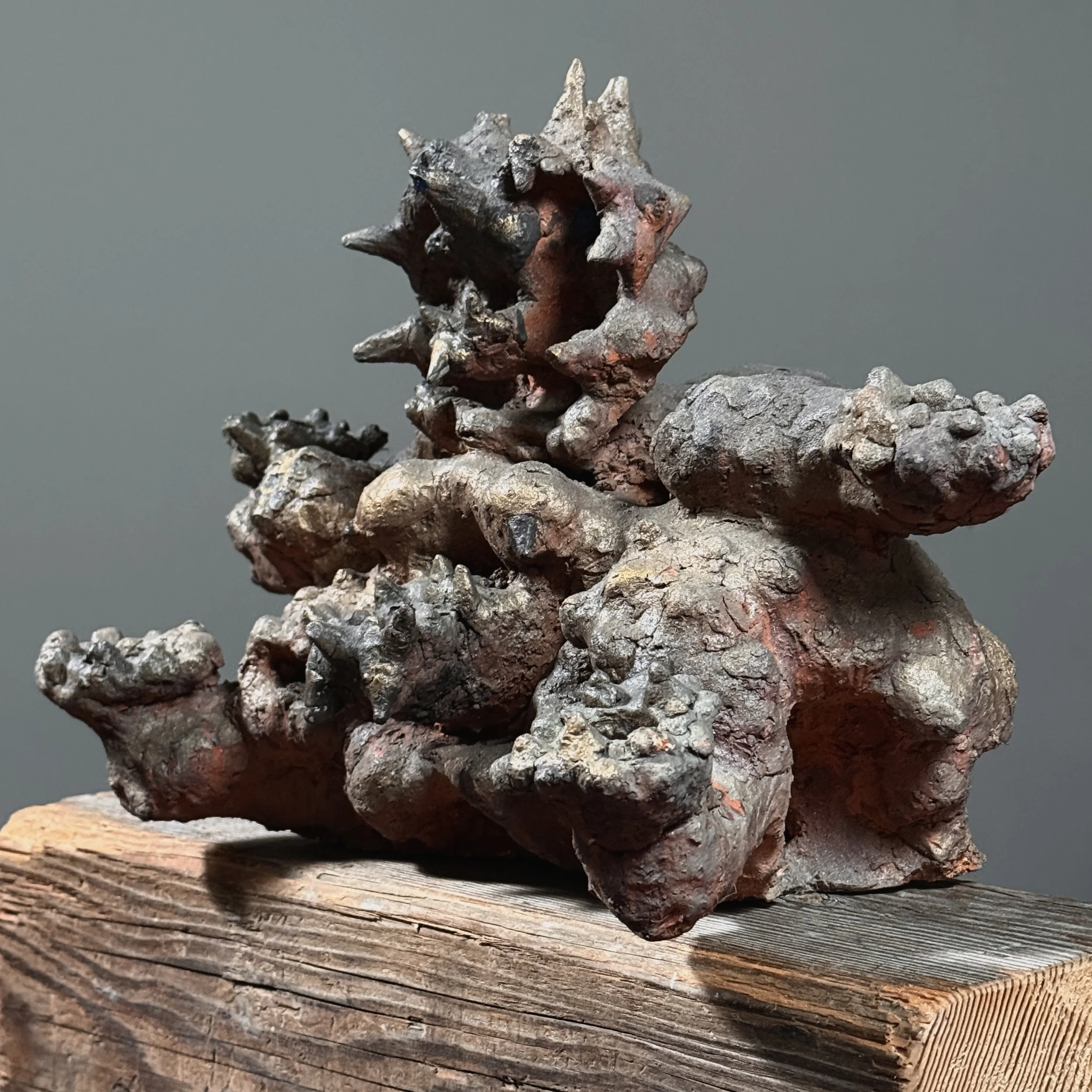 Raymond Rocklin brutalist abstract demon stoneware candelabra. 13.18 inches wide by 9.75 inches high by 9.5 inches deep.