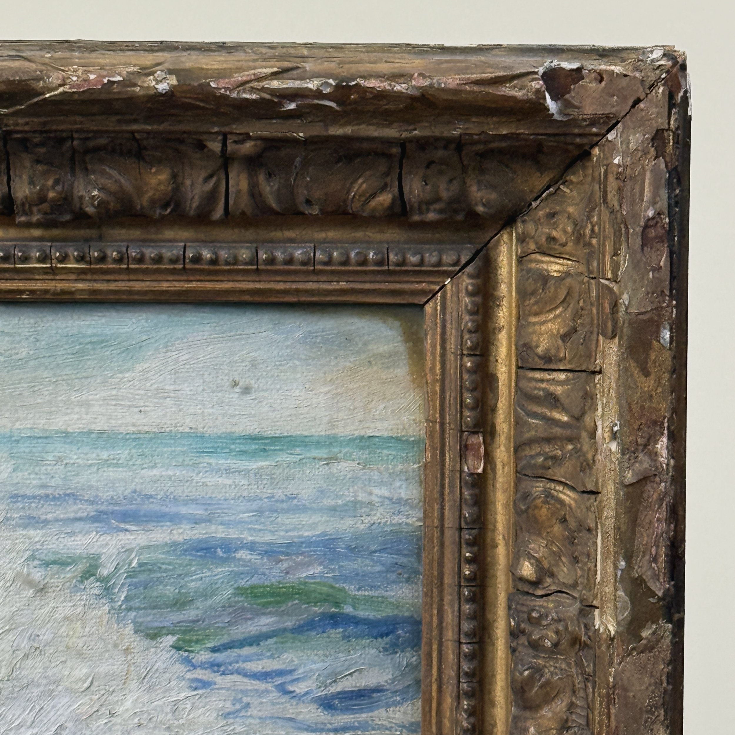 Frame corner. Cracks and breaks visible in gilt frame.