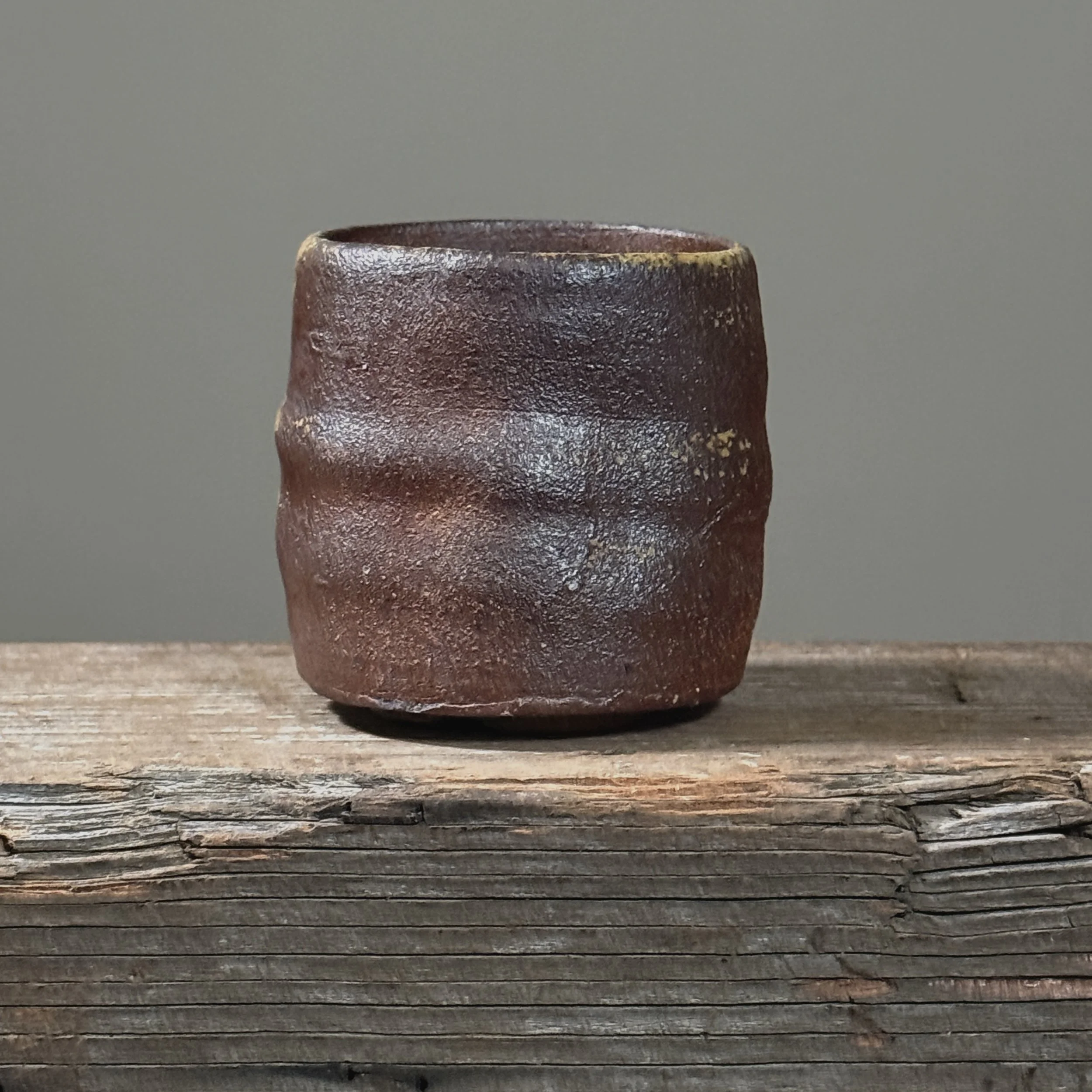 Handcrafted wood fired stoneware tea cup modernist style