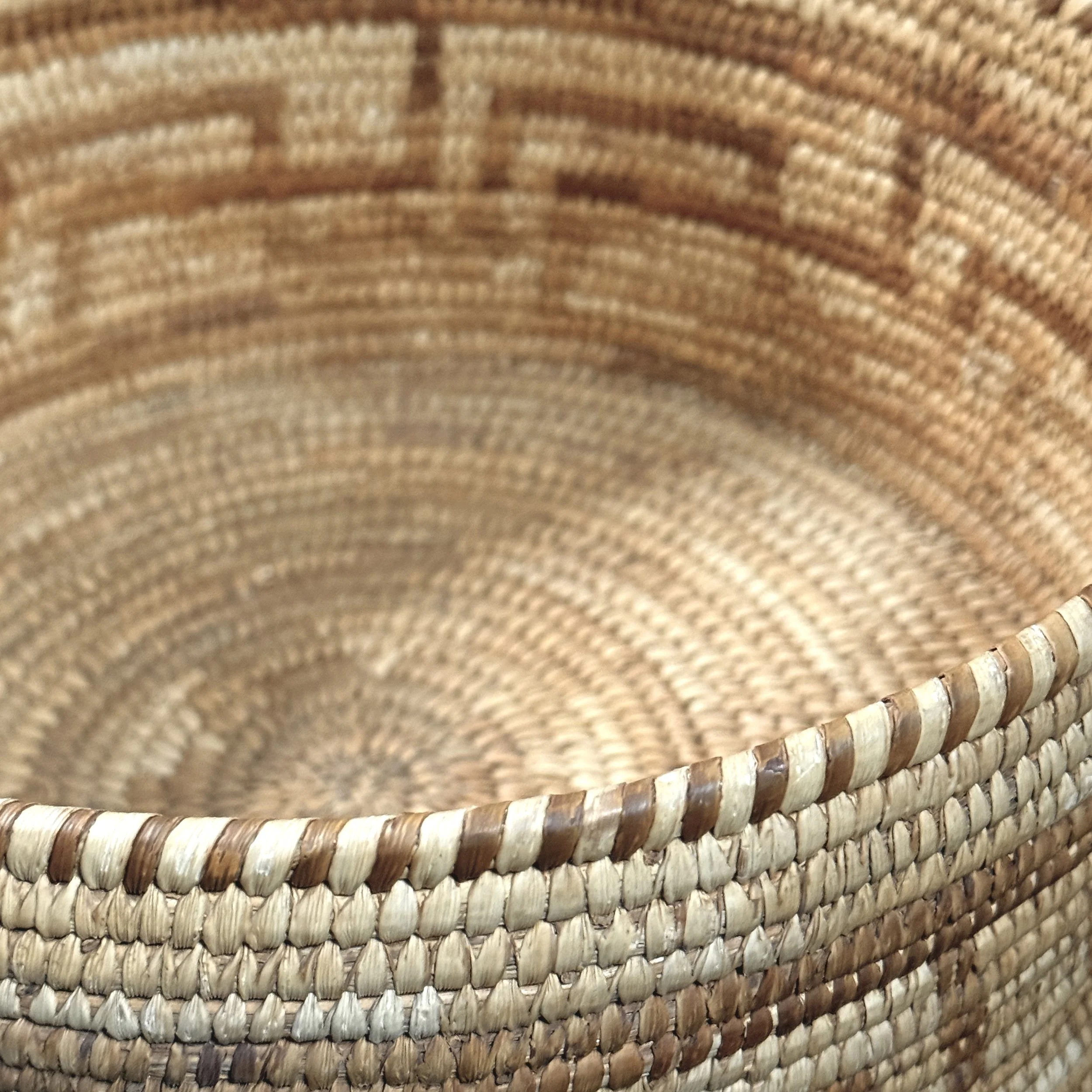 Detail of coiling technique and stitch construction.