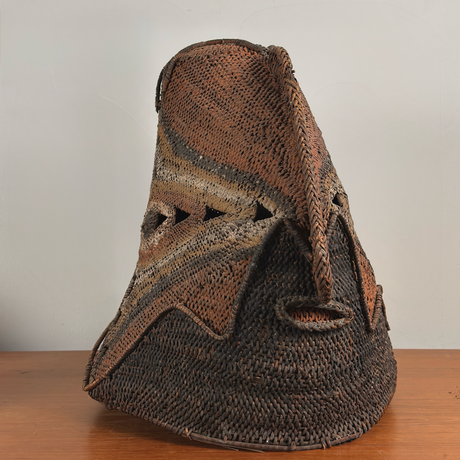 Monumental antique Abelam Baba Tagwa yam helmet mask full view woven cane fiber pigments