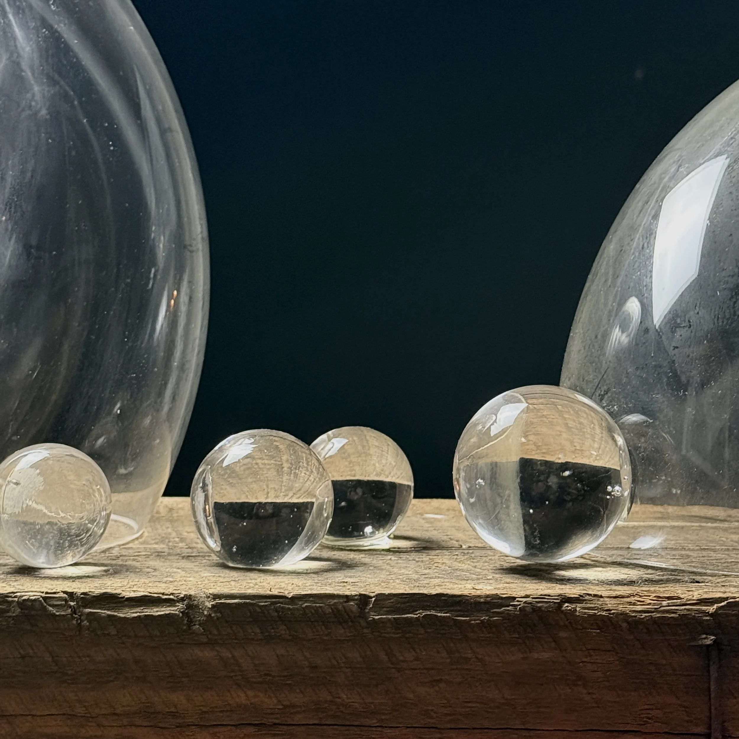 Close-up of delicate glass spheres attached to main sculptural form