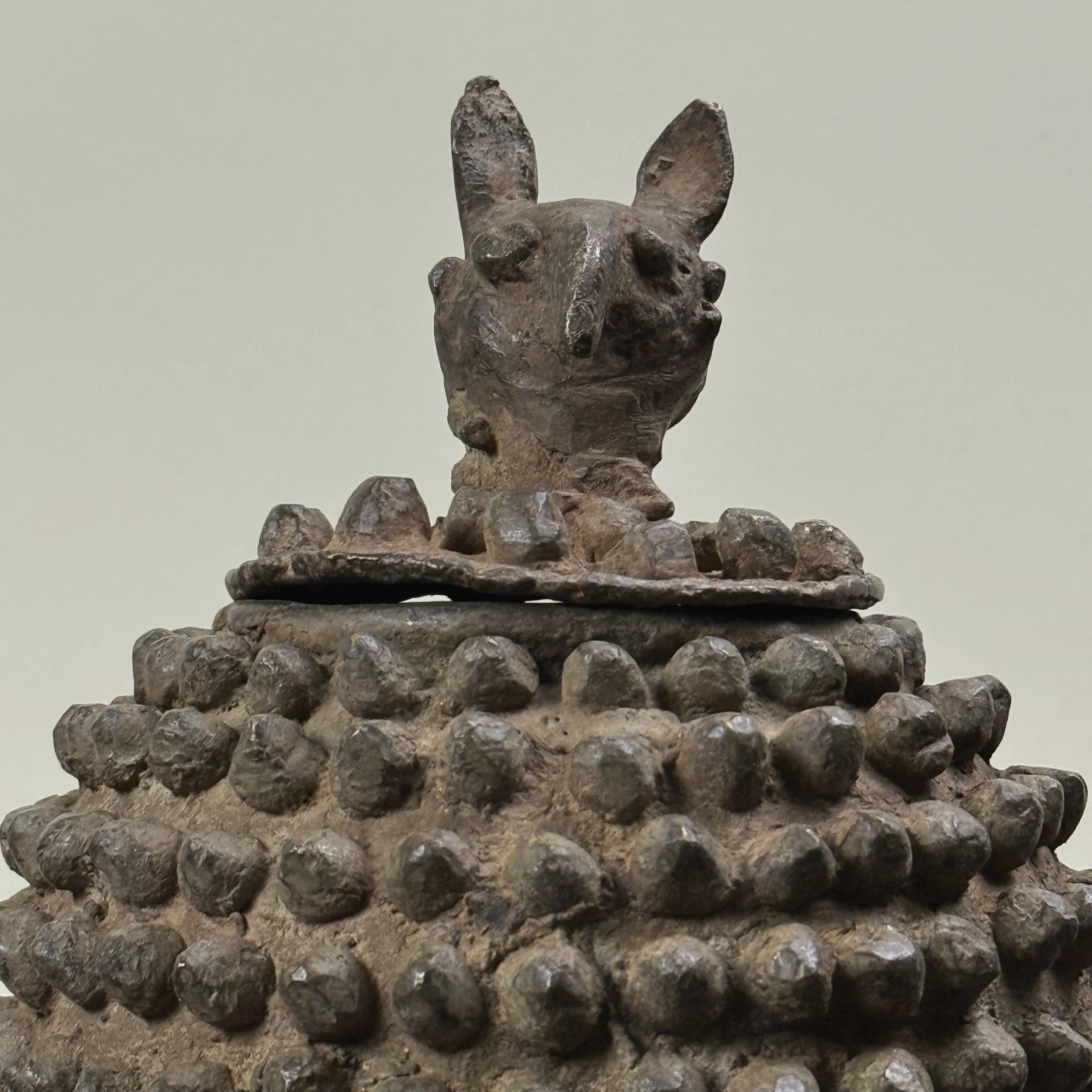 Lid detail showing zoomorphic sculptural form