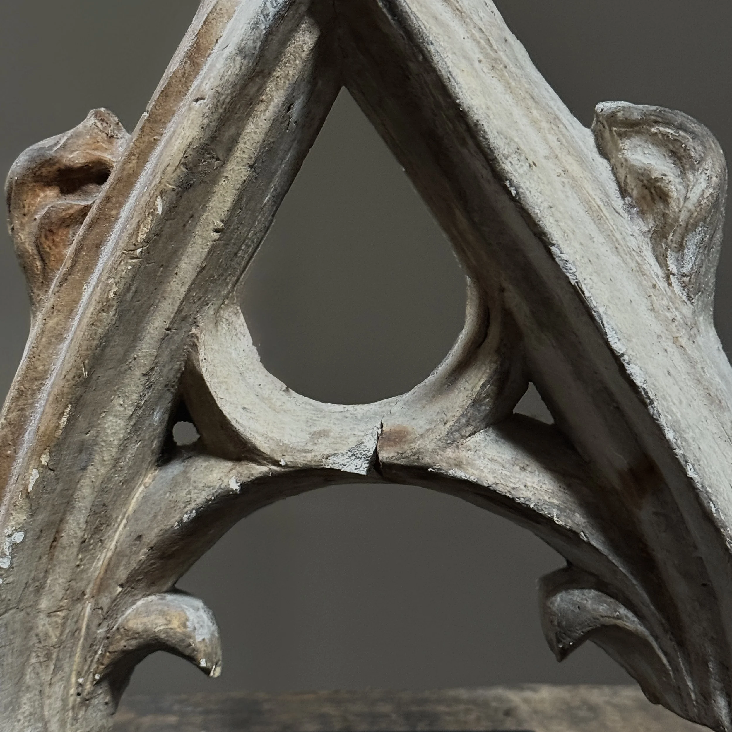 Close-up of plaster detailing and worn edges