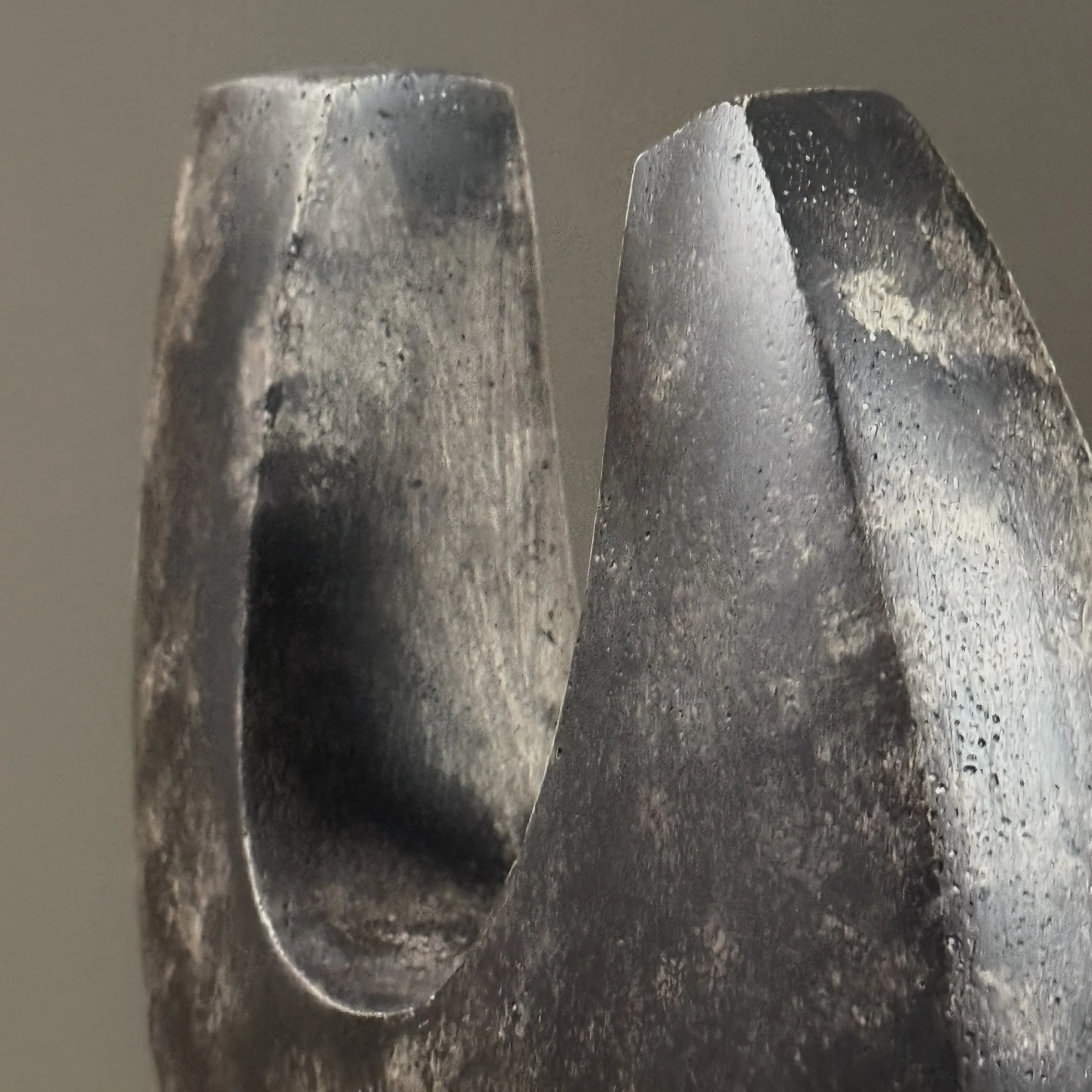 Macro detail of the cement surface texture and subtle tonal variations in the patina