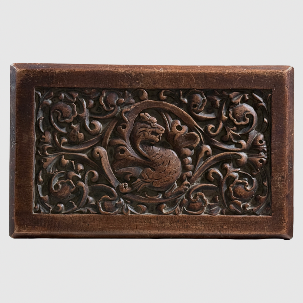 Antique hand-carved Gothic English step stool with scrolled lion and Green Man carvings