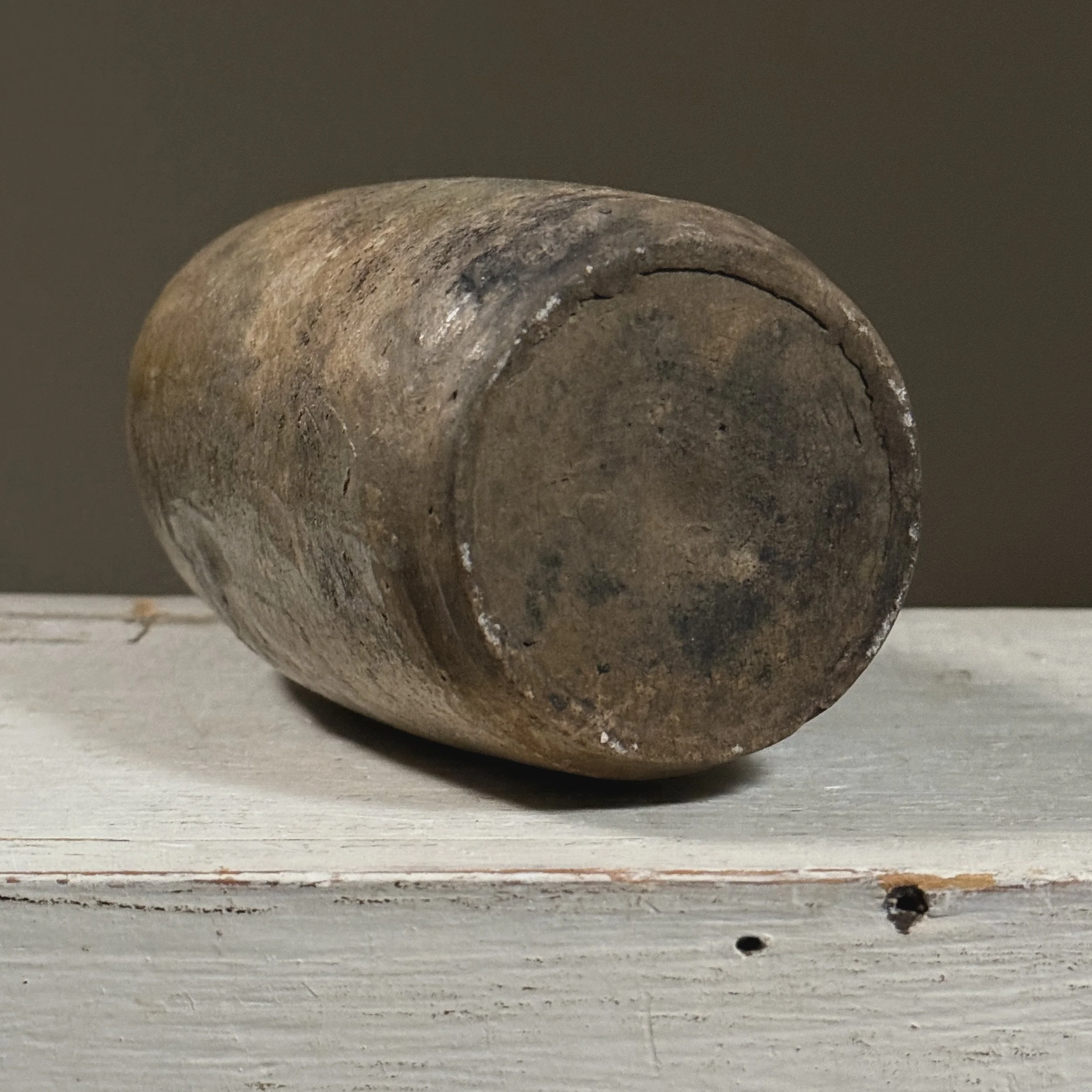 View of the base, showing unglazed foot and exposed clay body.