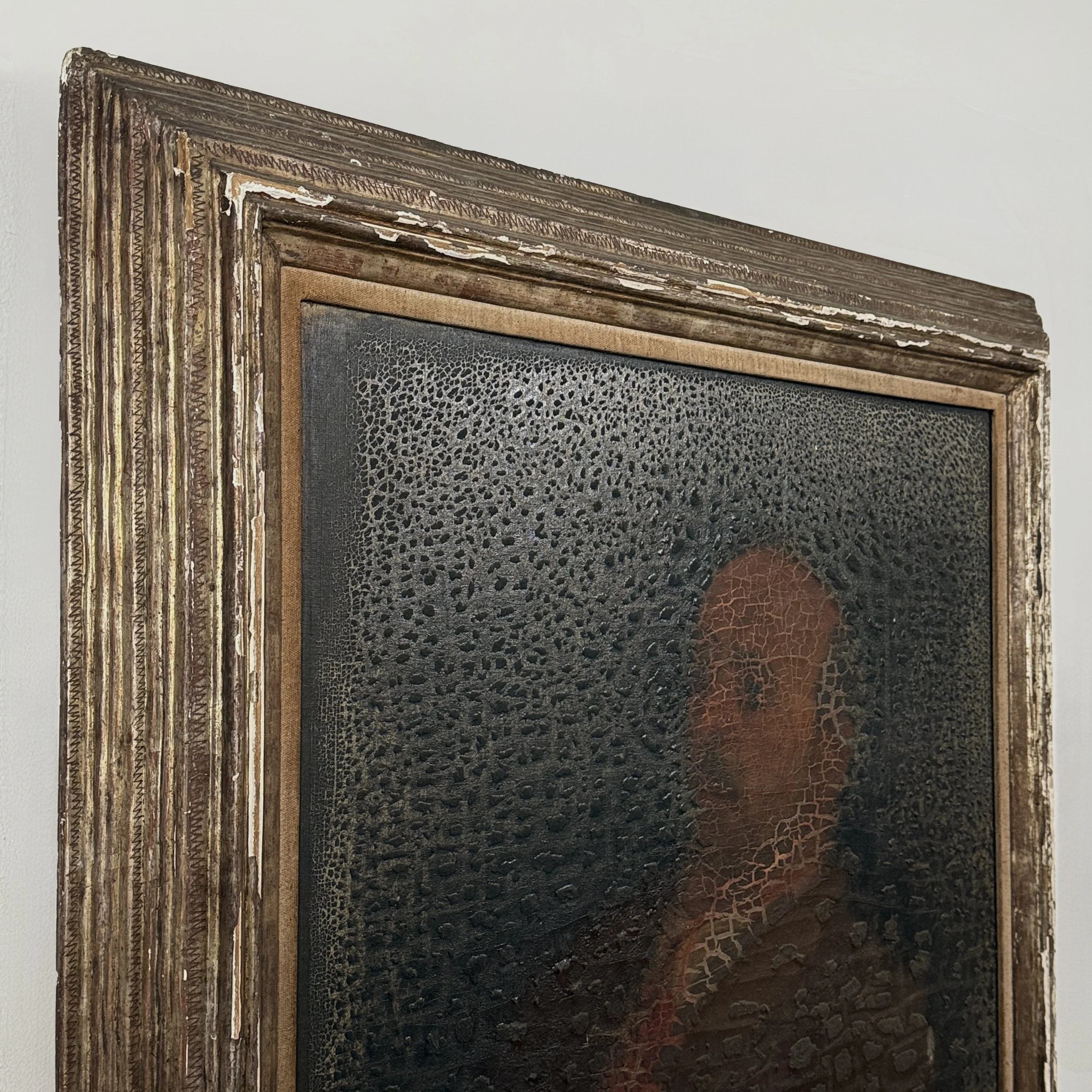 Raking light view emphasizing the topography of the craquelure.