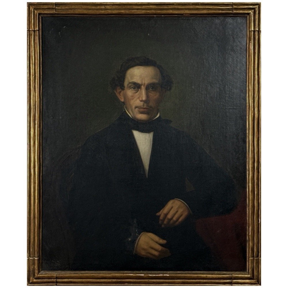 Full frontal view of the 19th-century oil portrait of Levi J. Workum in its original bronzed frame.