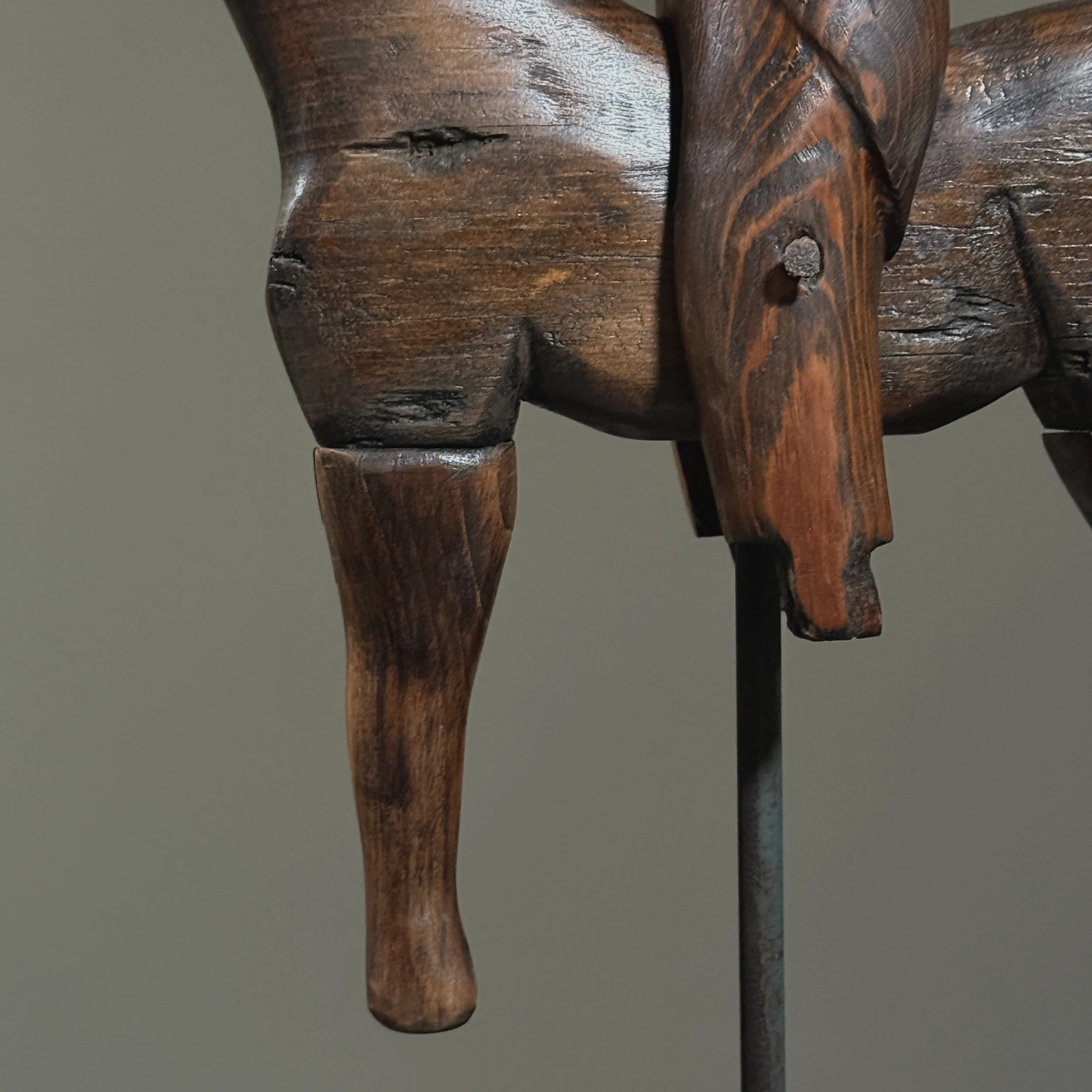 Close up of soldier’s shoe and horse’s leg