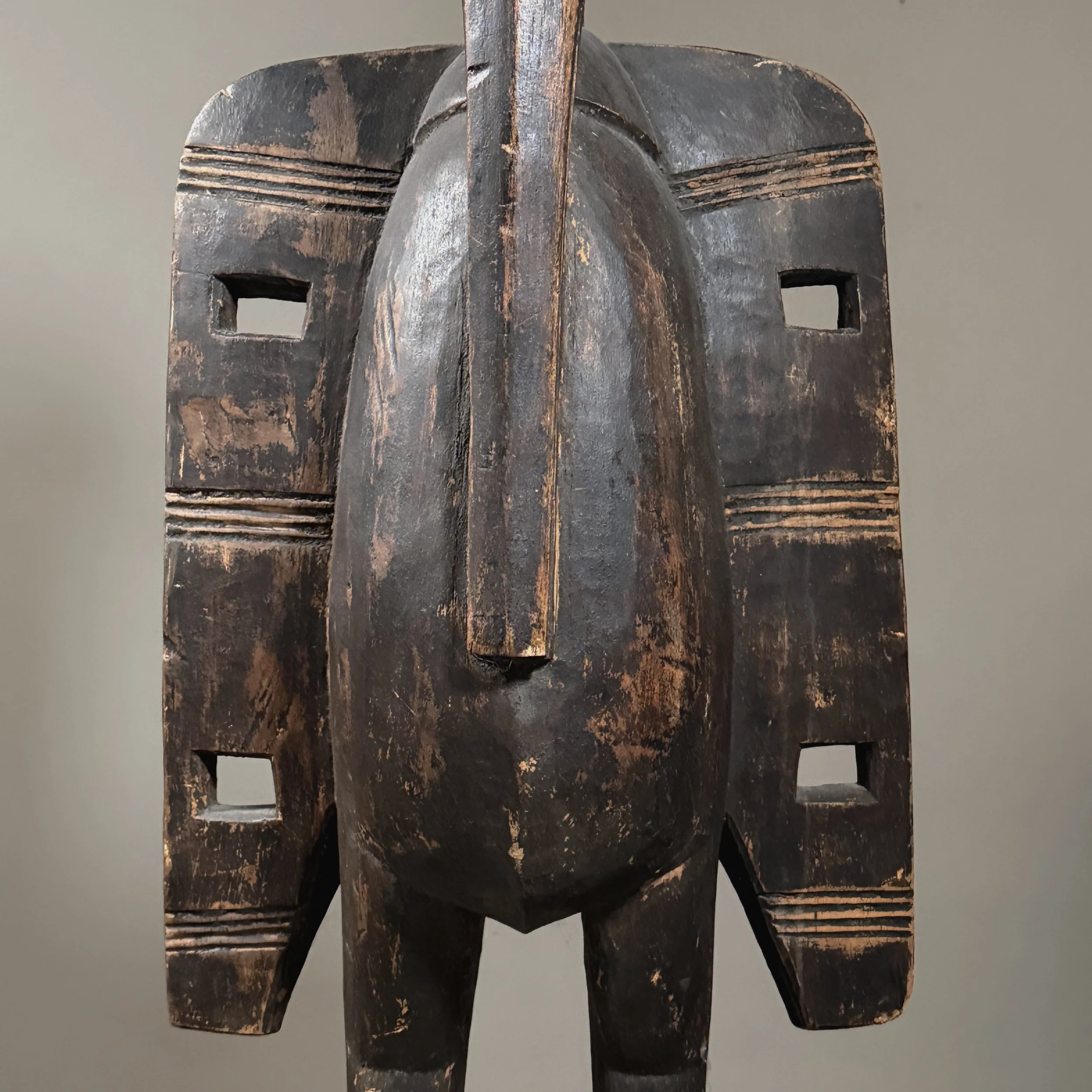 Close up of geometric carvings on wing interiors