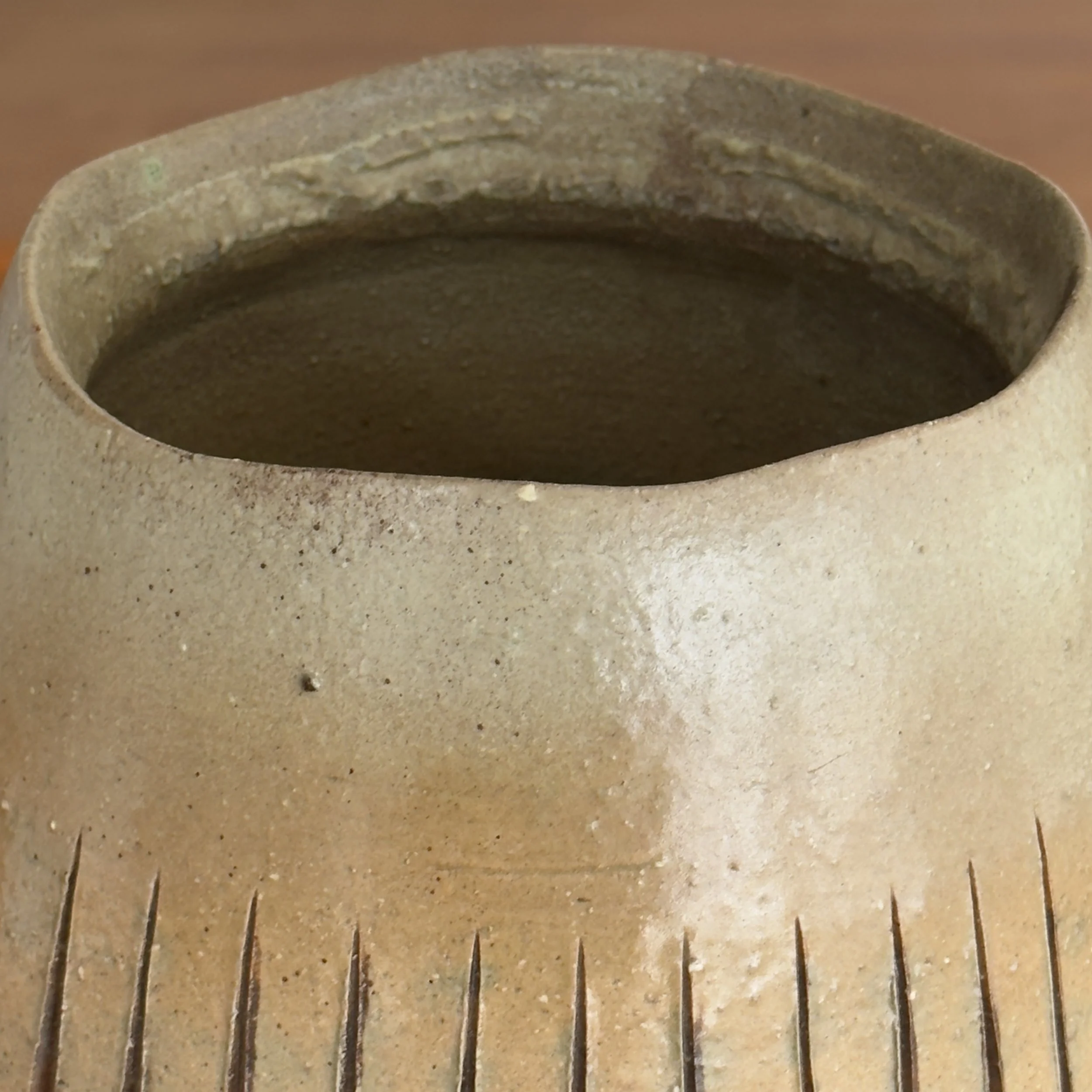Wood fired surface detail, ash and flame effects, stoneware vessel