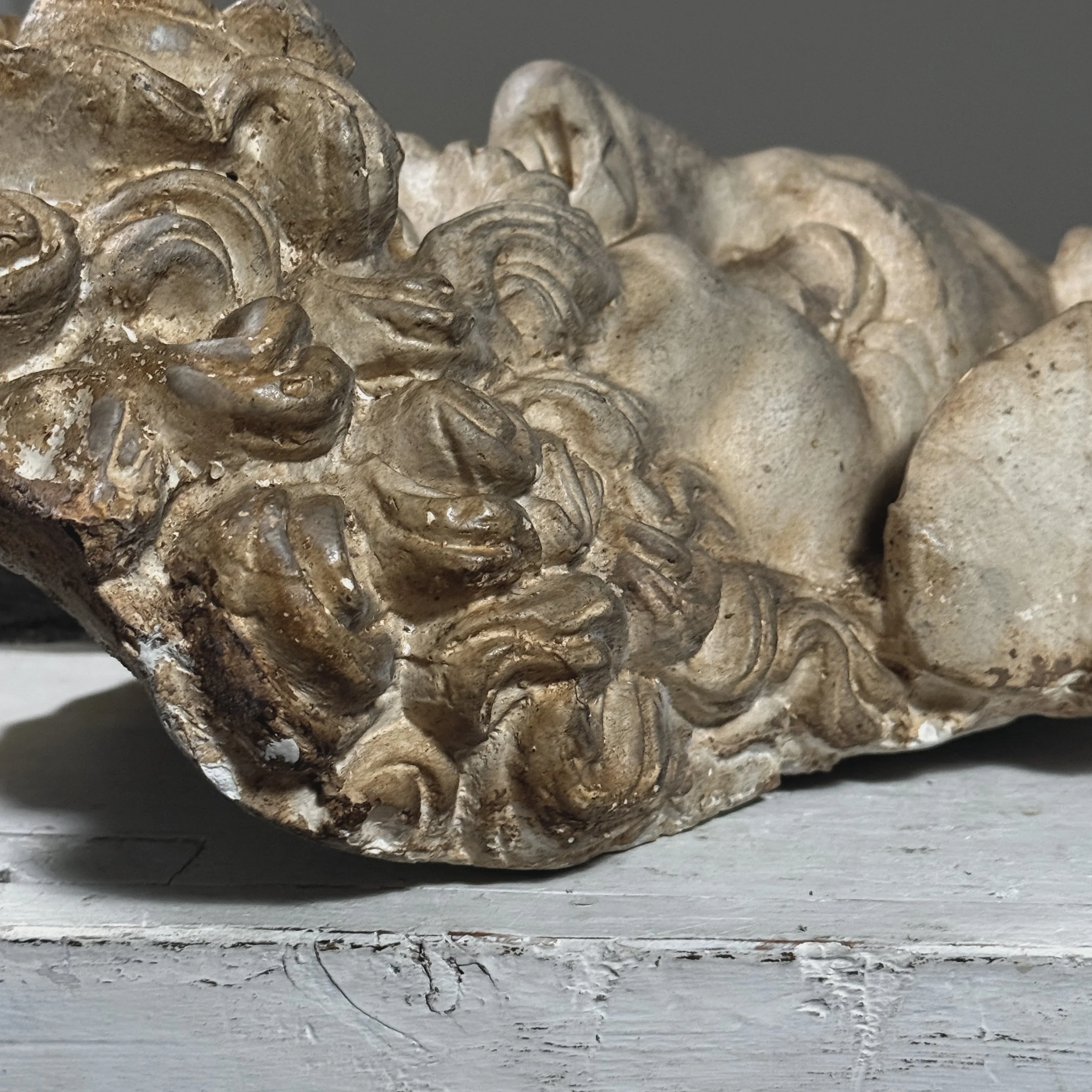 Detail shot of the deep sculptural lines in the beard and hair.