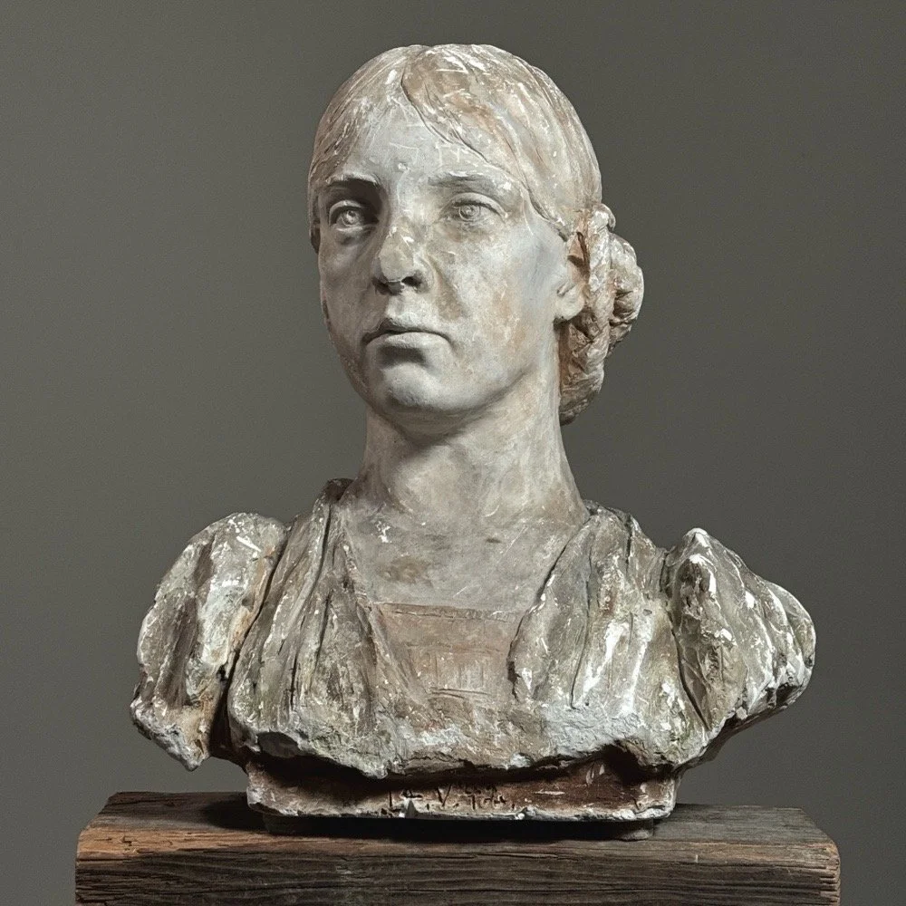 Antique Classical Revival female bust with braided hair, front view