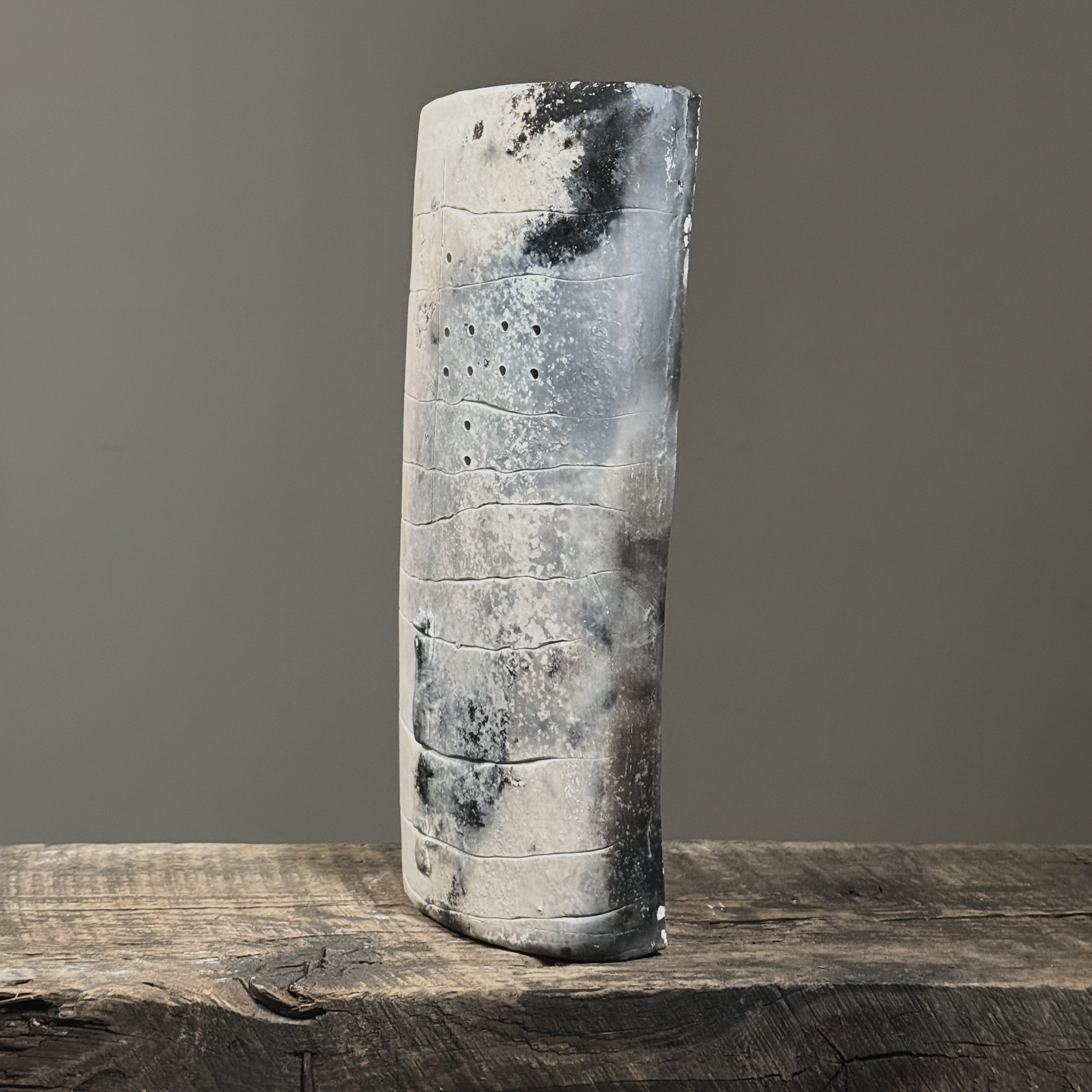 Textured white raku sculpture side profile