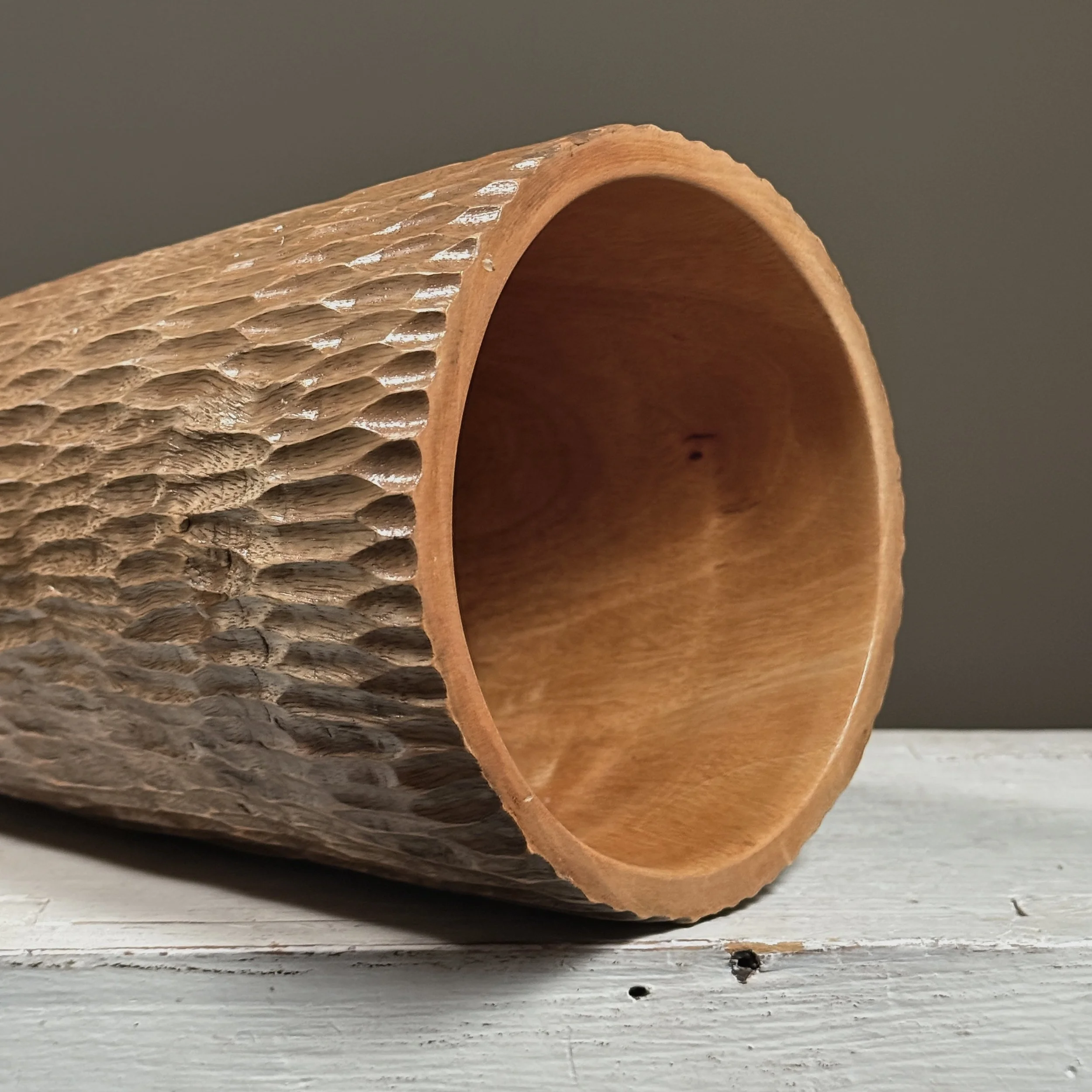 Close-up of the transition between carved and uncarved areas.