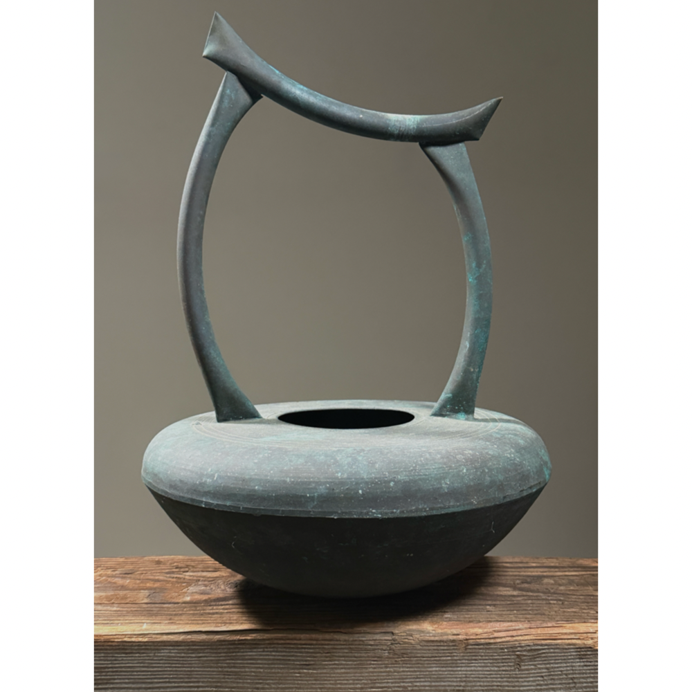 Vintage Japanese Modernist verdigris metal vessel with handle. 15 inches height by 10.75 inches diameter.
